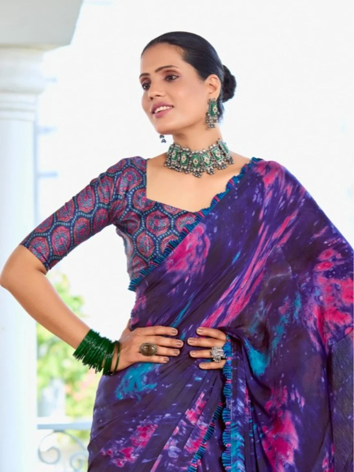 Tarani purple satin saree upper body view showcasing stylish blouse and jewelry