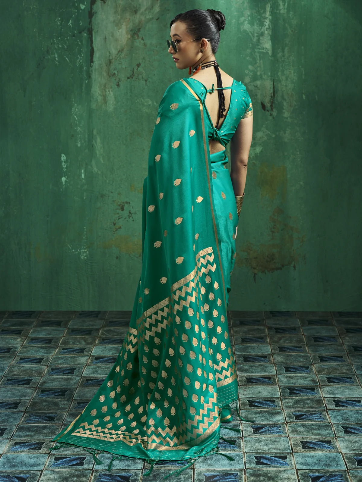 Tarani teal green Pure Satin Handloom Weaving saree back view with detailed pallu and border