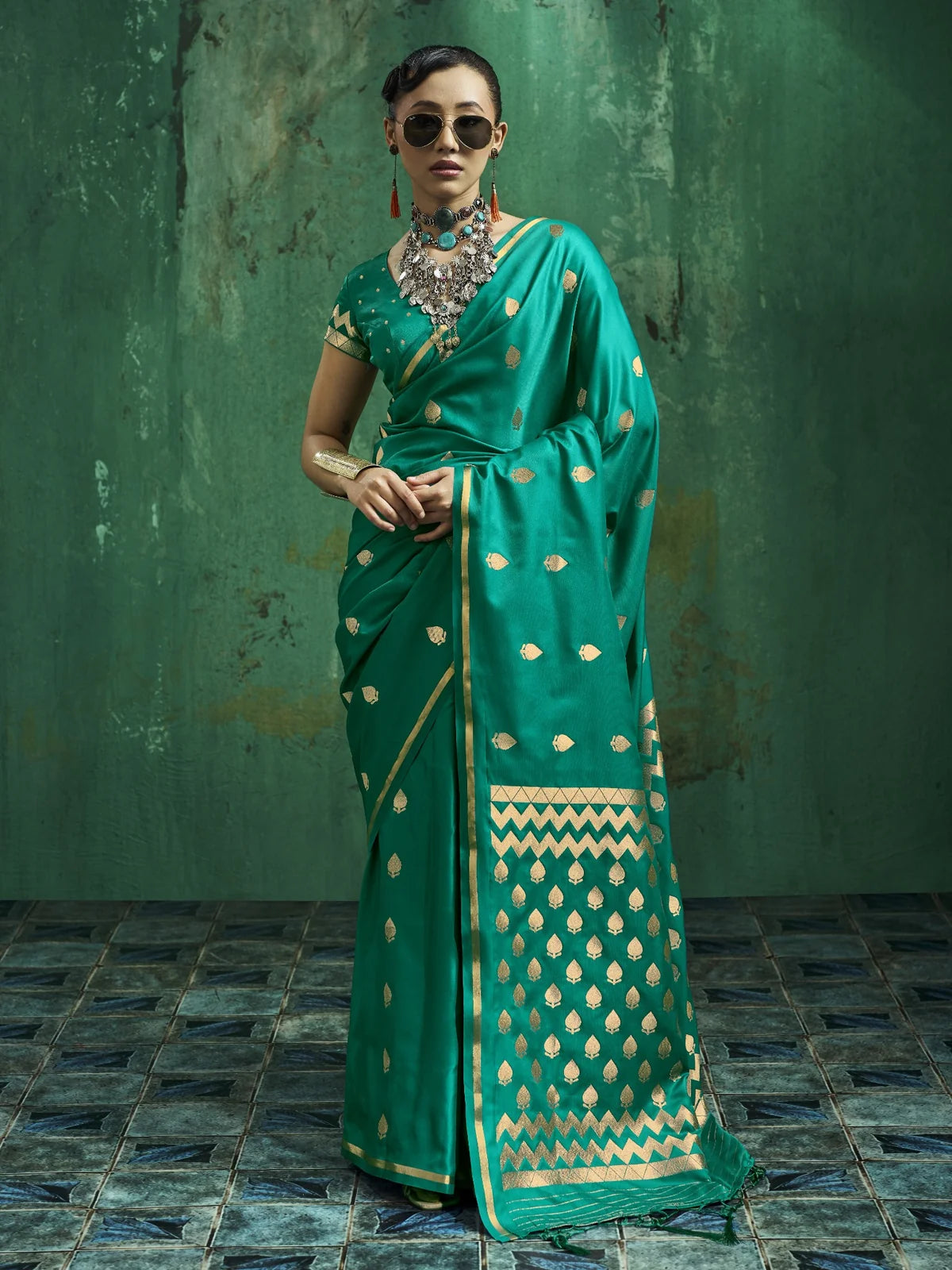 Tarani teal green Pure Satin Handloom Weaving saree full view with golden woven motifs and elegant festive drape