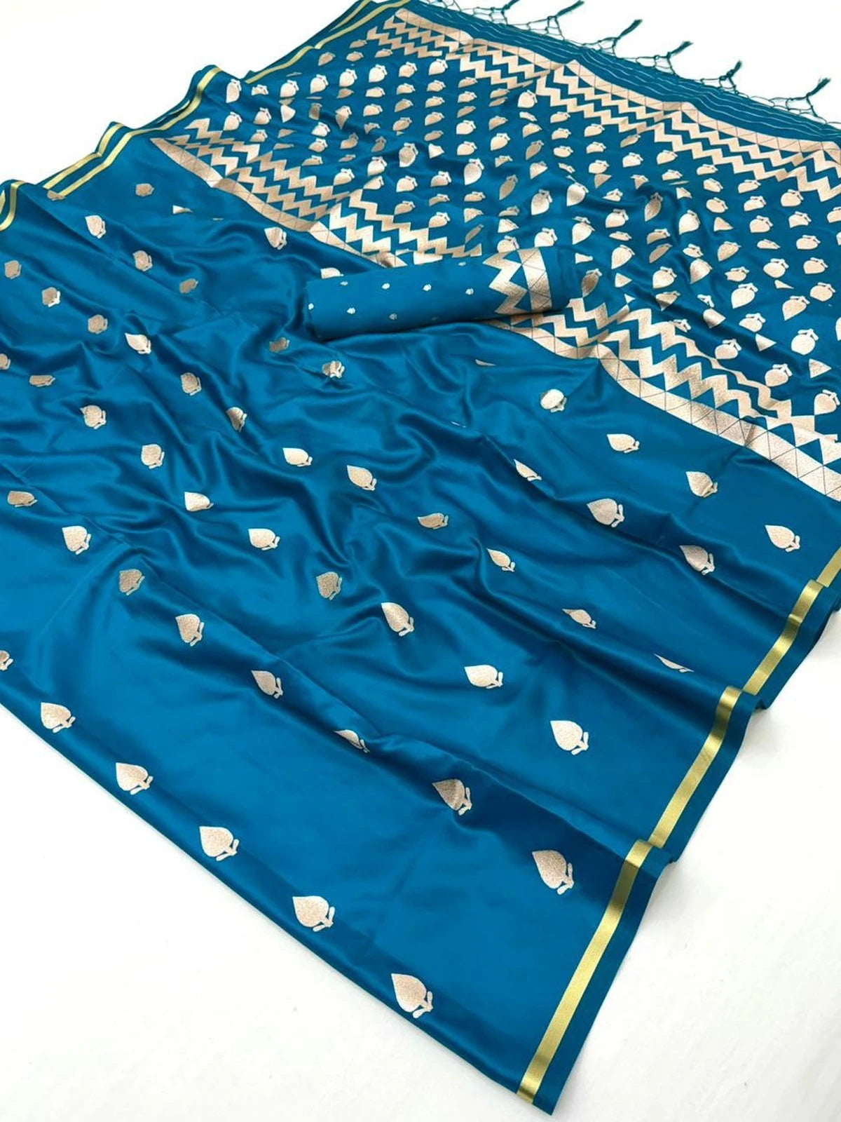Tarani Sarangi pure satin teal saree pallu view with zari woven border and motifs