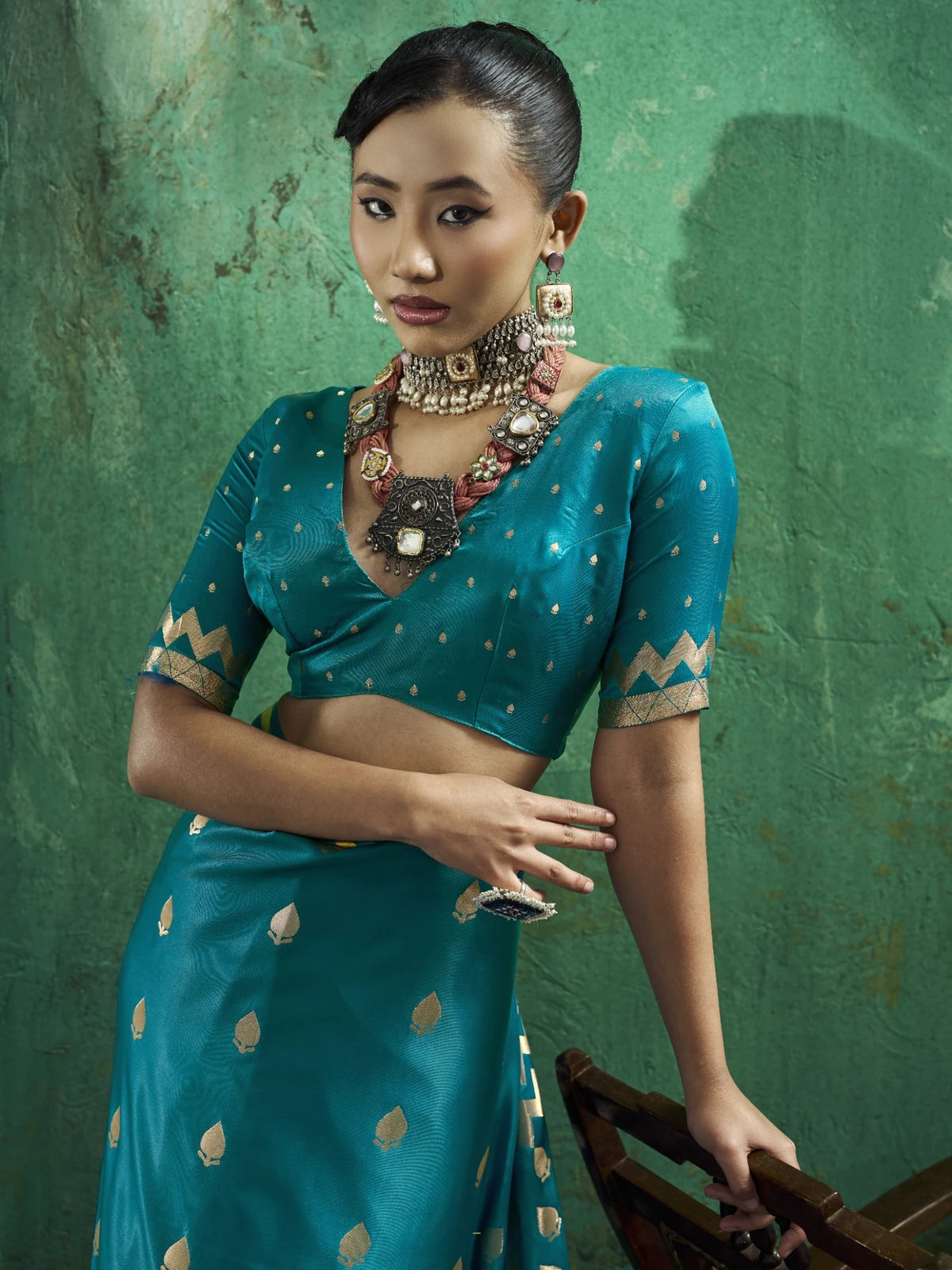 Tarani Sarangi teal pure satin saree upper body view with woven blouse and zari detailing