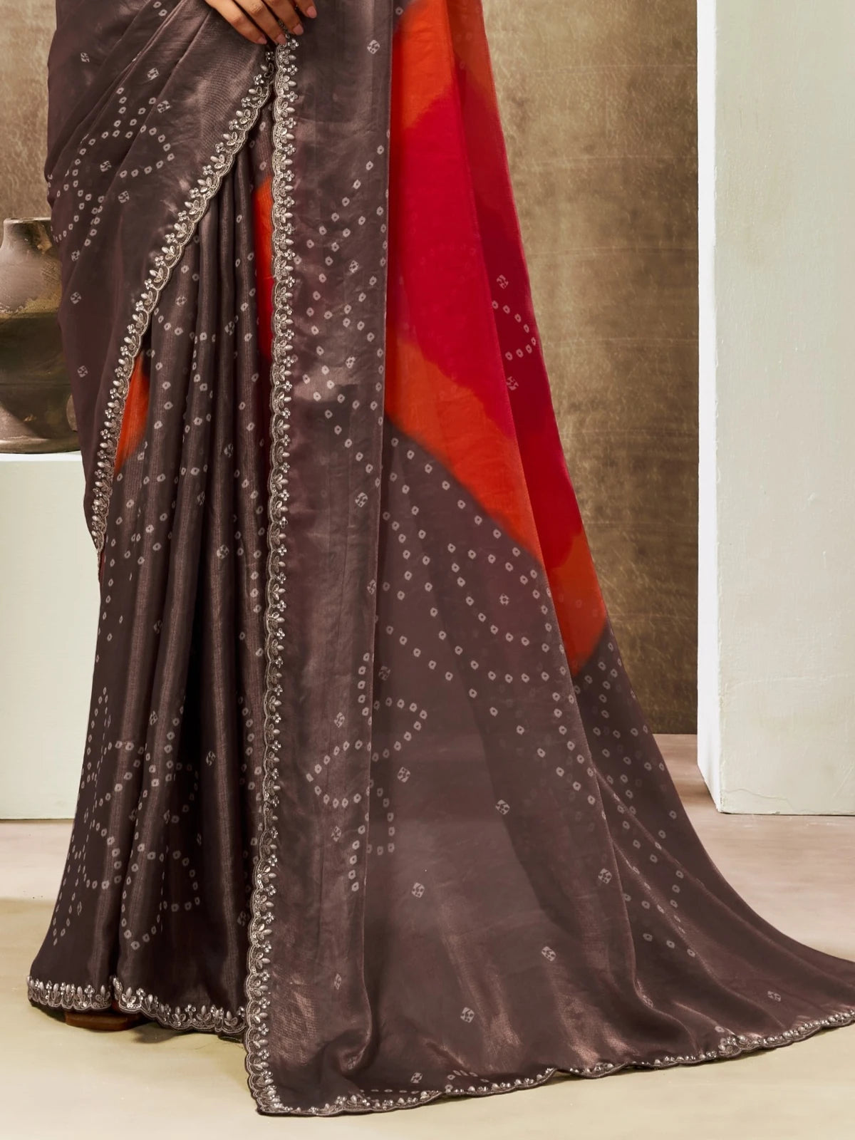Tarani Sucharita brown satin silk saree closeup view highlighting drape texture and designer border