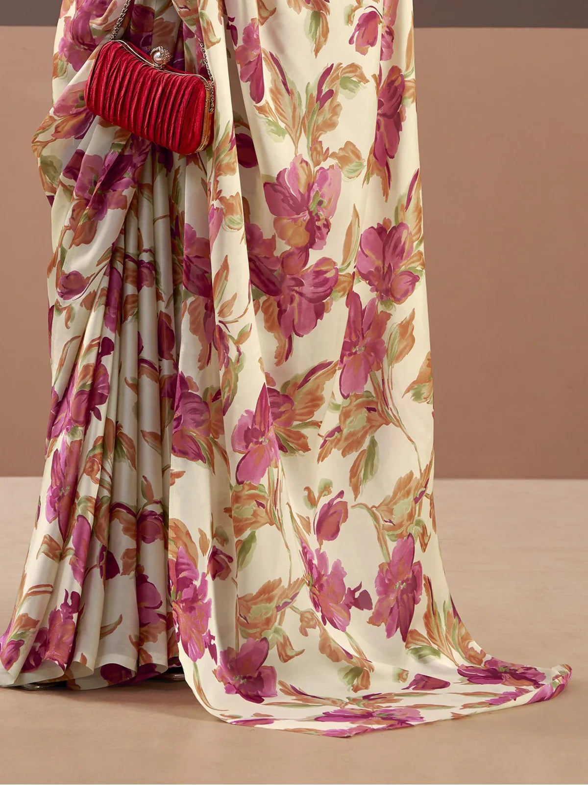 Tarani close-up of cream satin silk saree with floral prints and texture detailing