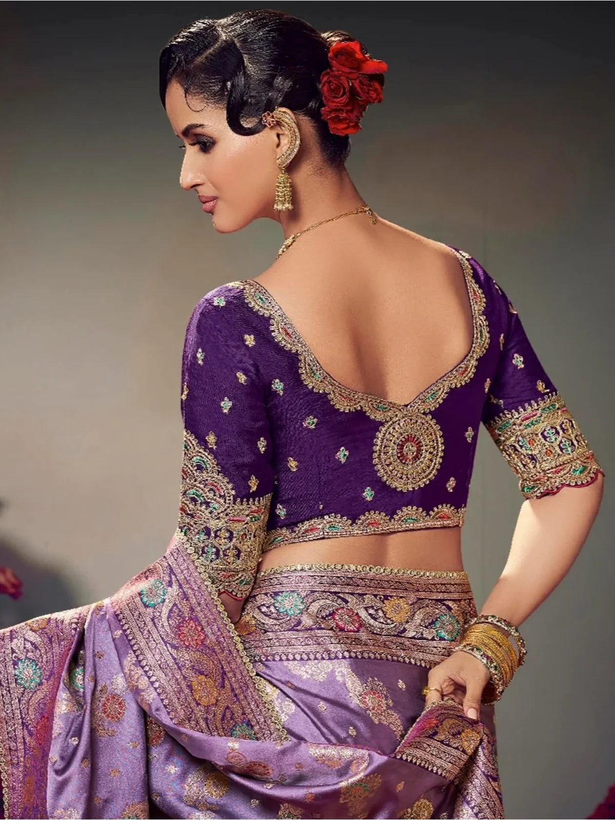Tarani satin silk saree blouse in deep purple with rich embroidery and fine detailing