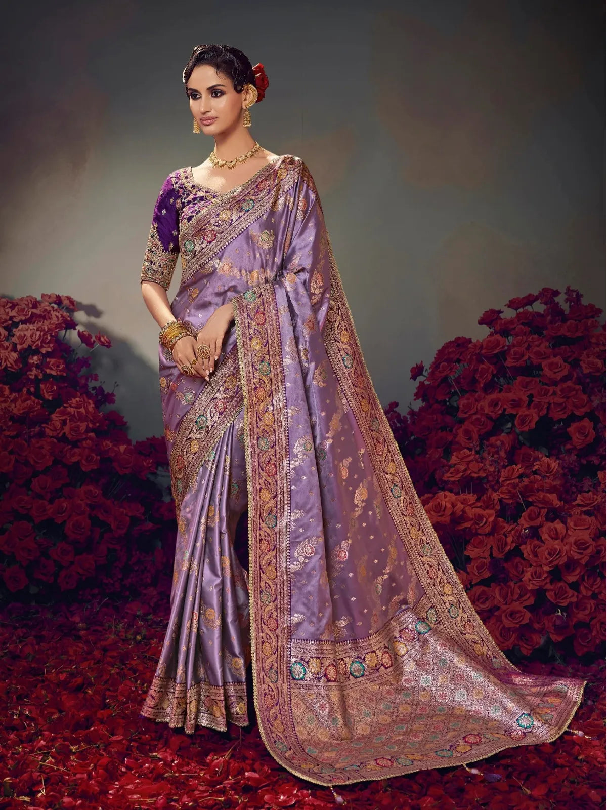 Tarani lavender satin silk saree with intricate golden zari border and elegant drape for party wear