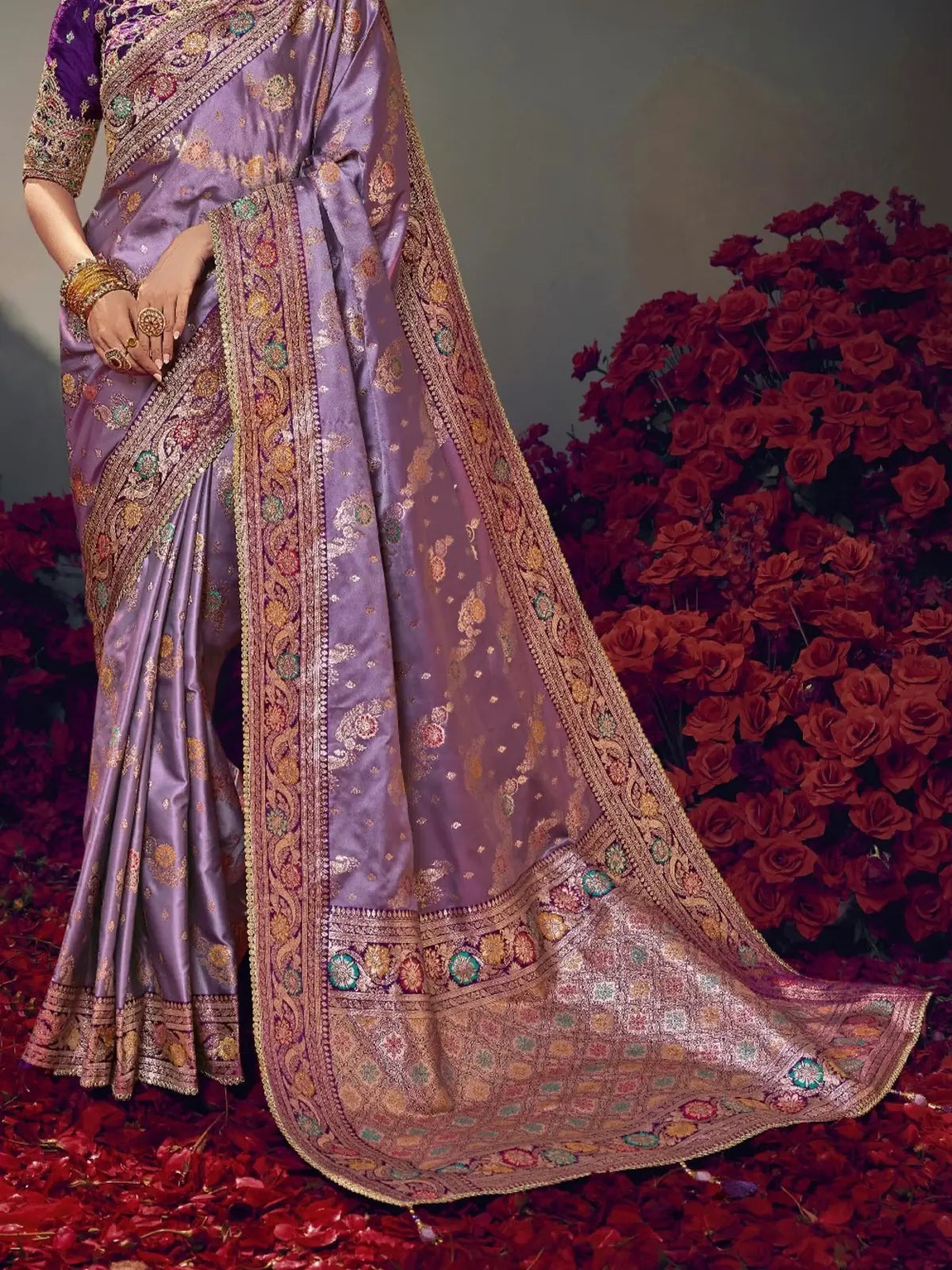 Tarani satin silk saree showcasing beautifully woven lavender pallu and golden patterns