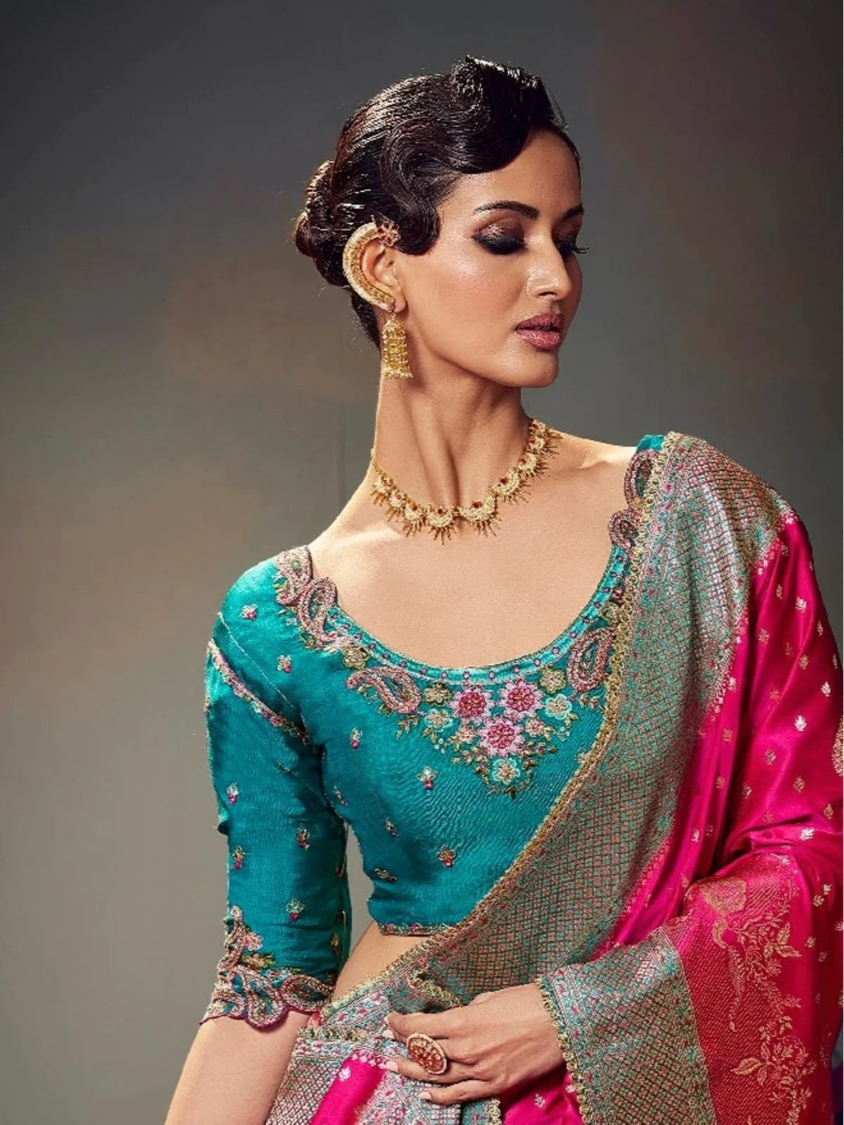 Tarani pink satin silk saree upper body view showing turquoise embroidered blouse design