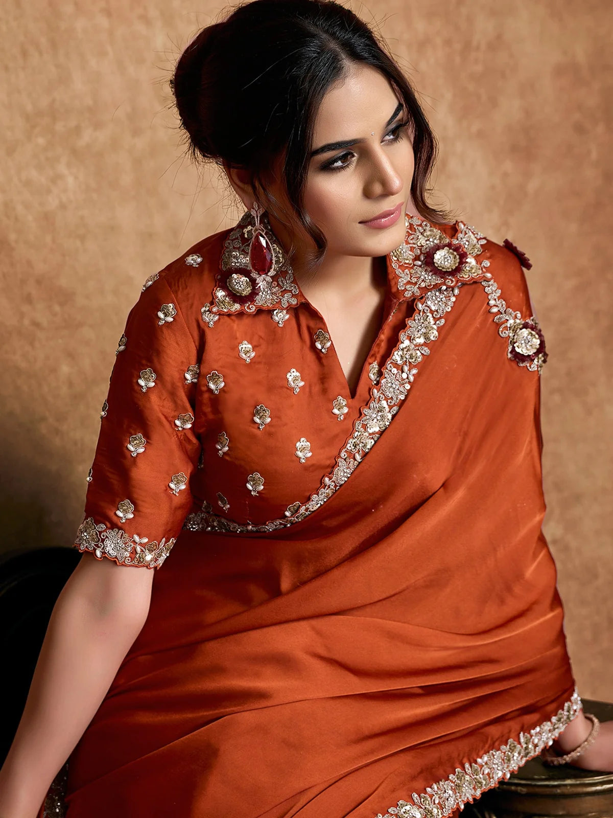 Tarani Ravina satin silk saree upper body view showcasing embellished blouse and embroidered border