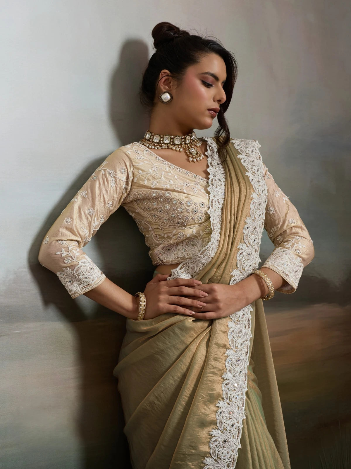 Tarani golden satin velvet saree blouse view with detailed embroidery and handwork finish