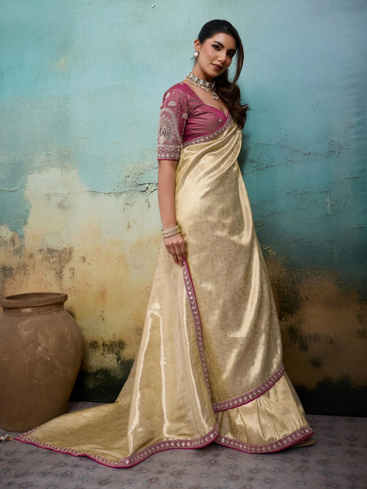 Tarani golden self woven tissue Banarasi saree side pose with elegant handcrafted border detailing
