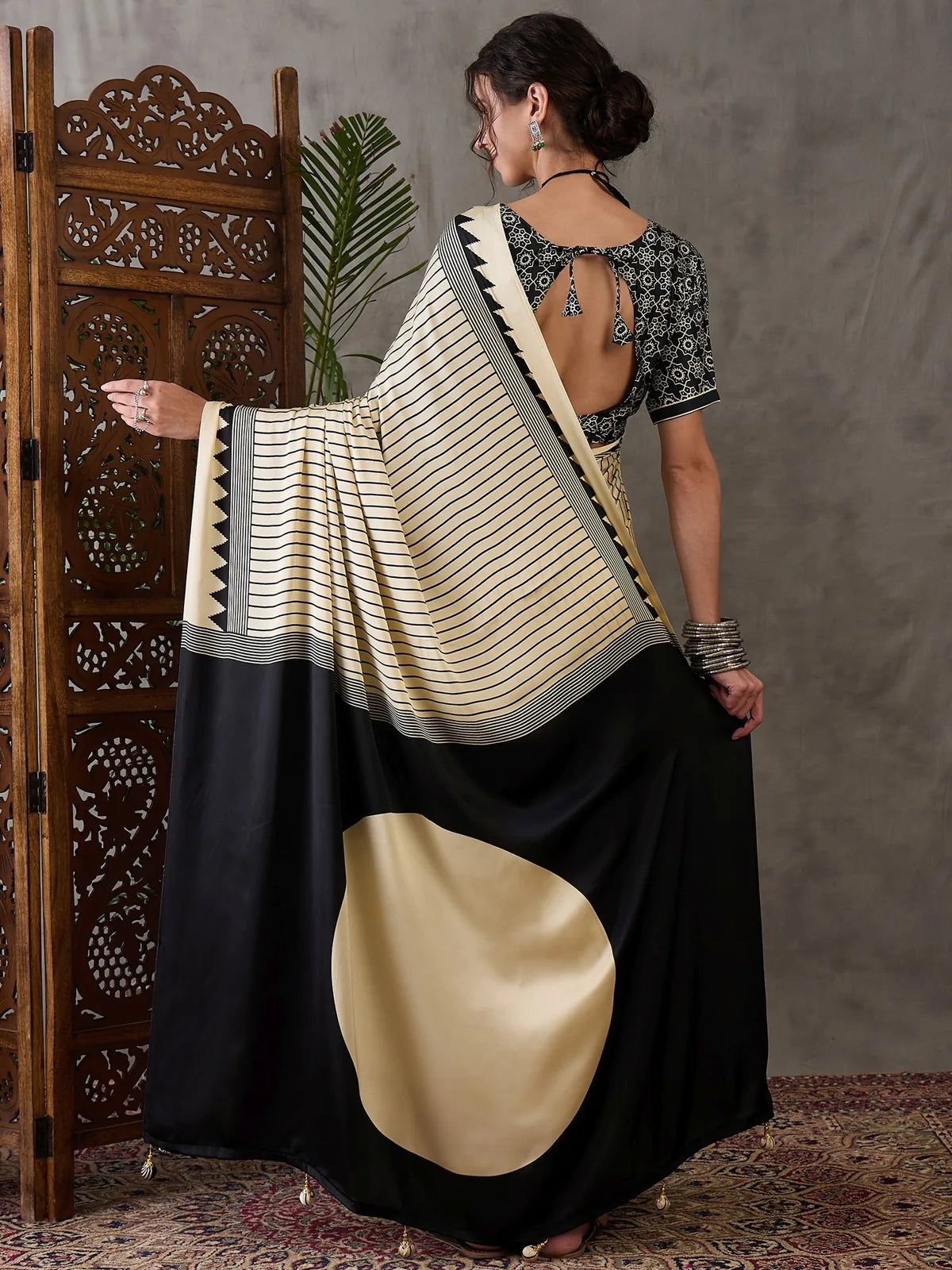 Tarani saree back view displaying blouse back pattern