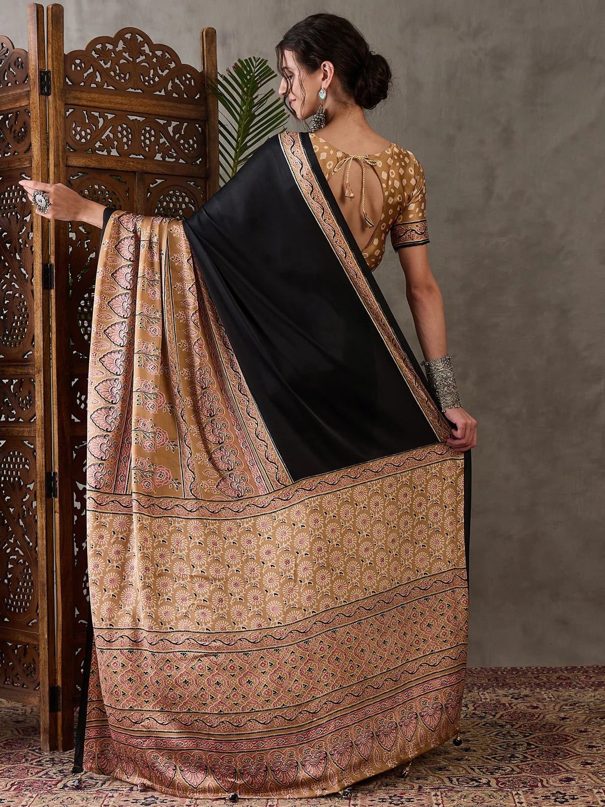 Tarani Dharika black semi modal satin printed saree back view showing blouse design