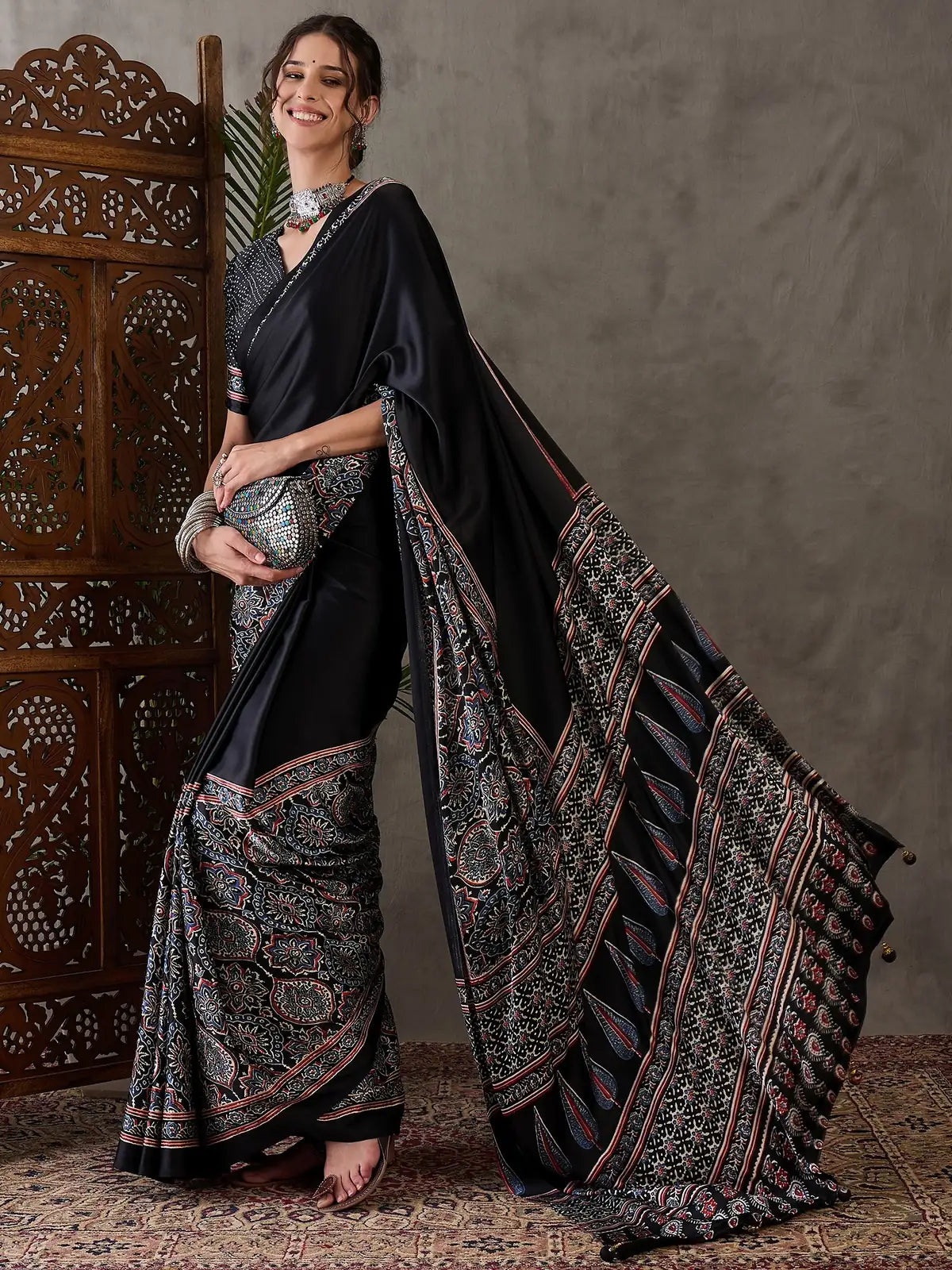 Tarani black semi modal satin saree full drape view with ethnic printed border