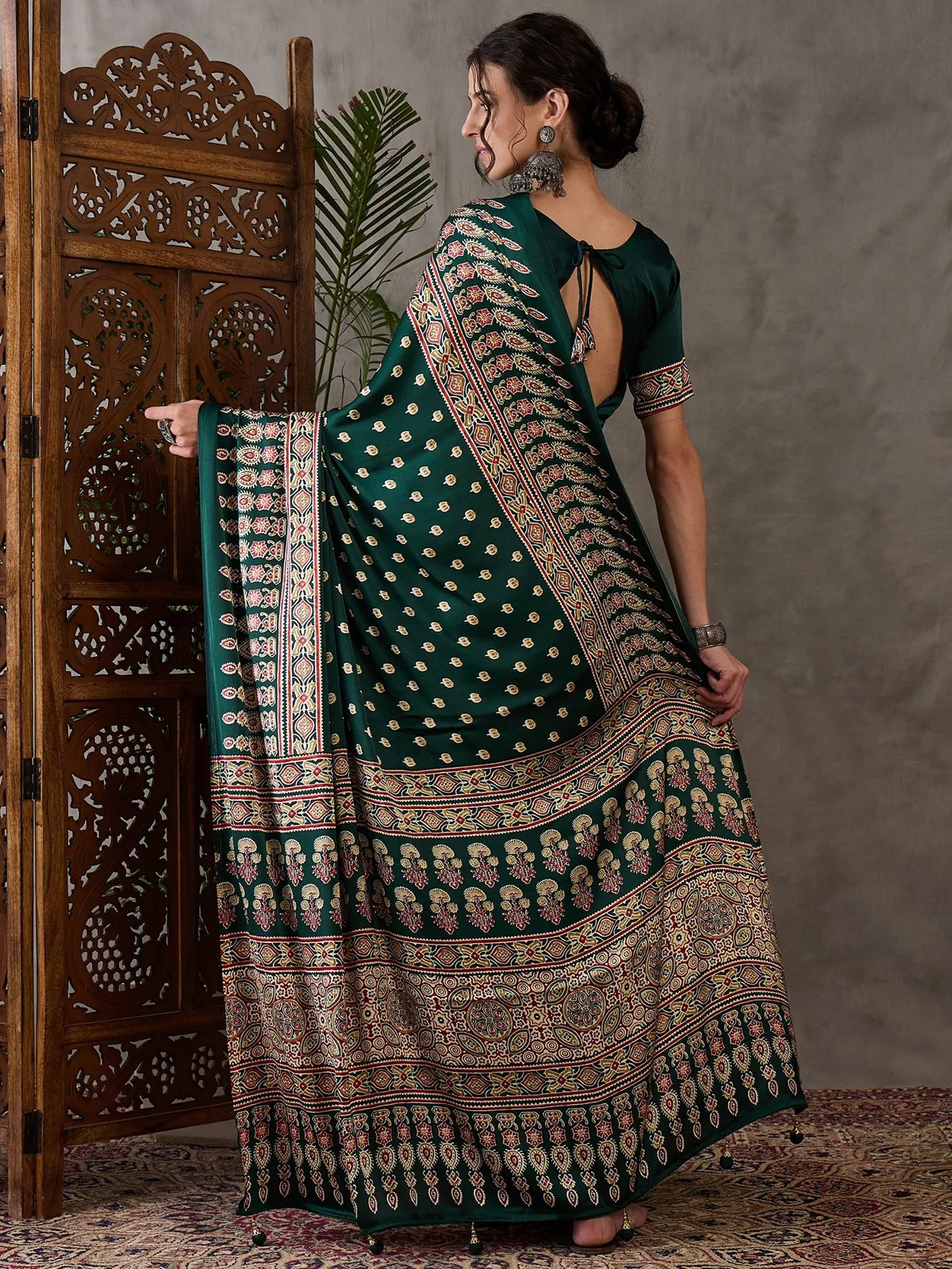 Tarani Mahika green semi modal satin saree back view showing full drape styling