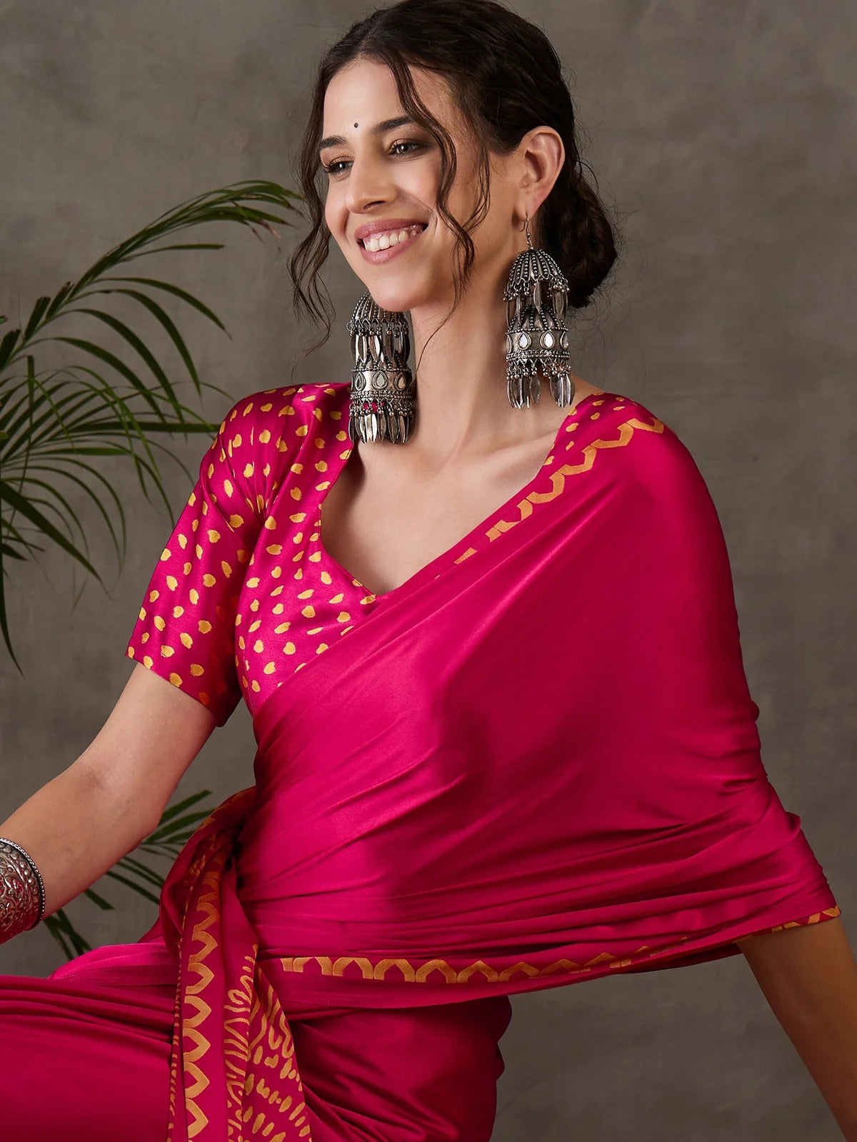 Tarani magenta semi modal satin saree close upper body fashion portrait