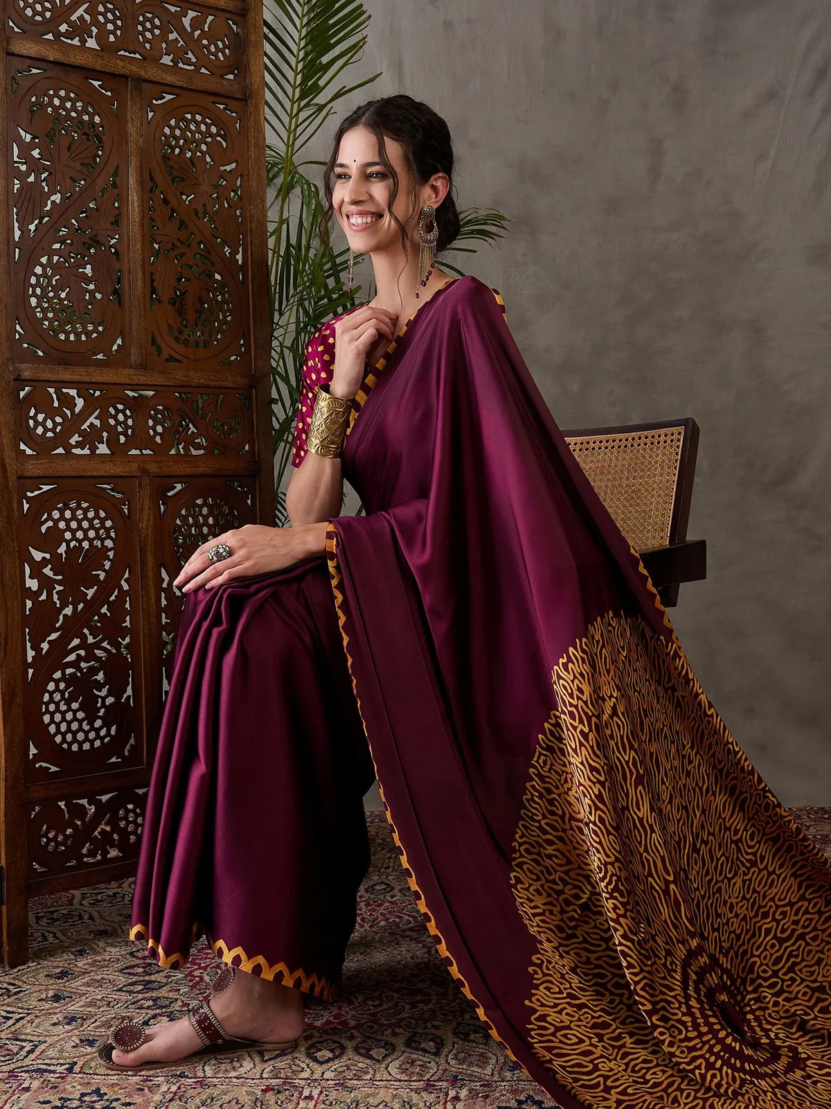 Tarani maroon semi modal satin saree pallu design and border detail Dhruti
