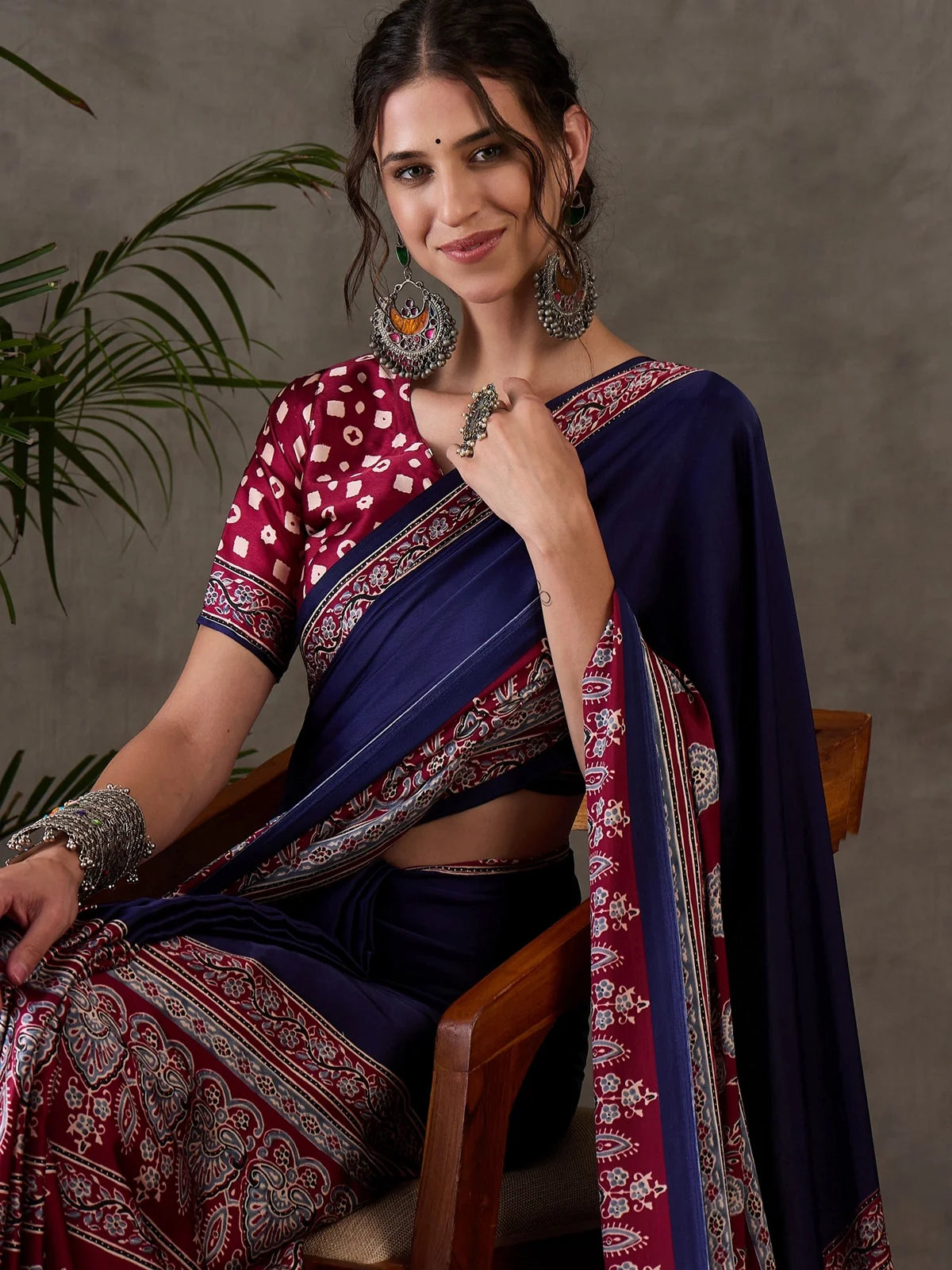 Tarani Ishaniya navy blue semi modal satin saree front view for festive and party wear styling