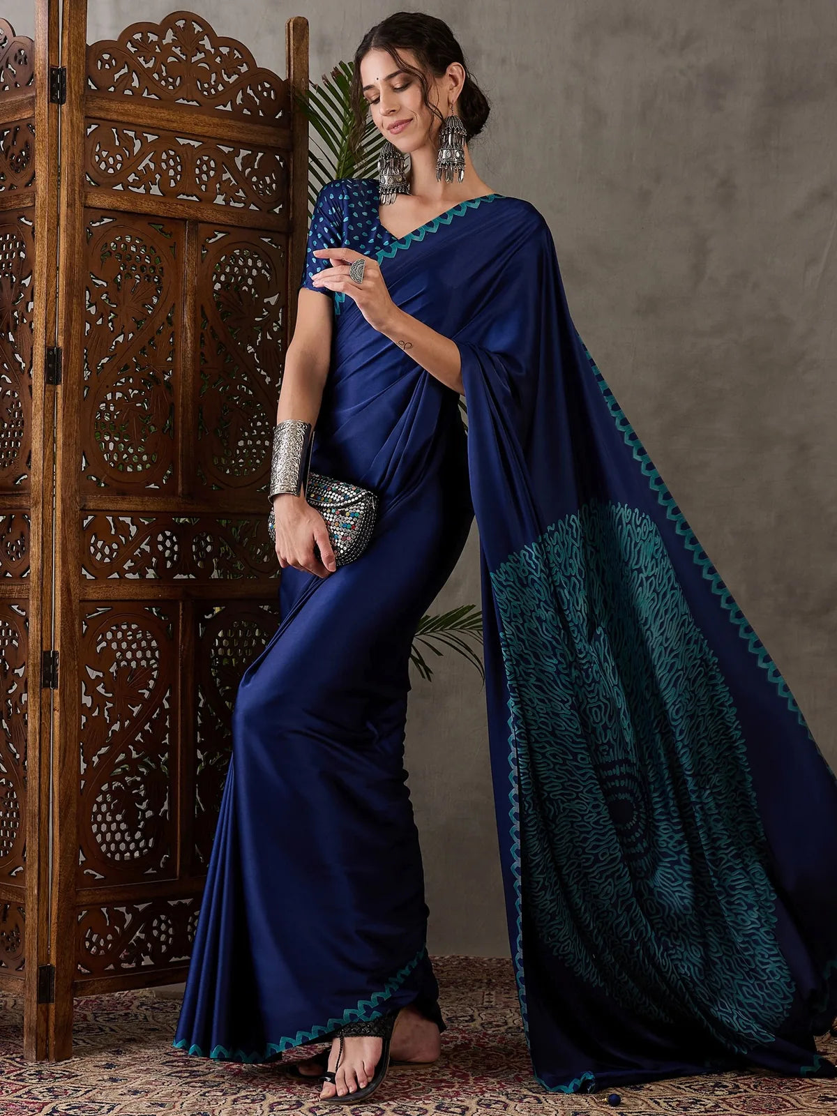 Tarani navy blue semi modal satin saree side pose highlighting pallu design