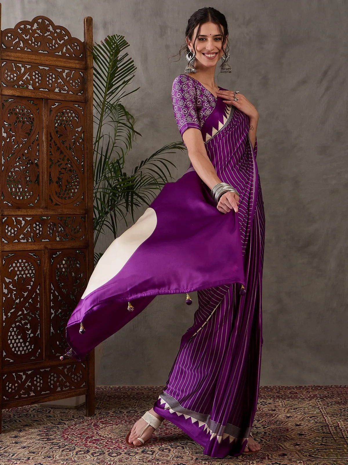 Tarani purple semi modal satin saree front view with elegant striped pattern