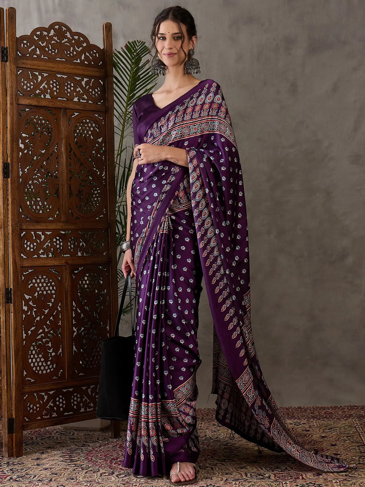 Tarani Pravika purple printed saree front view with matching blouse piece