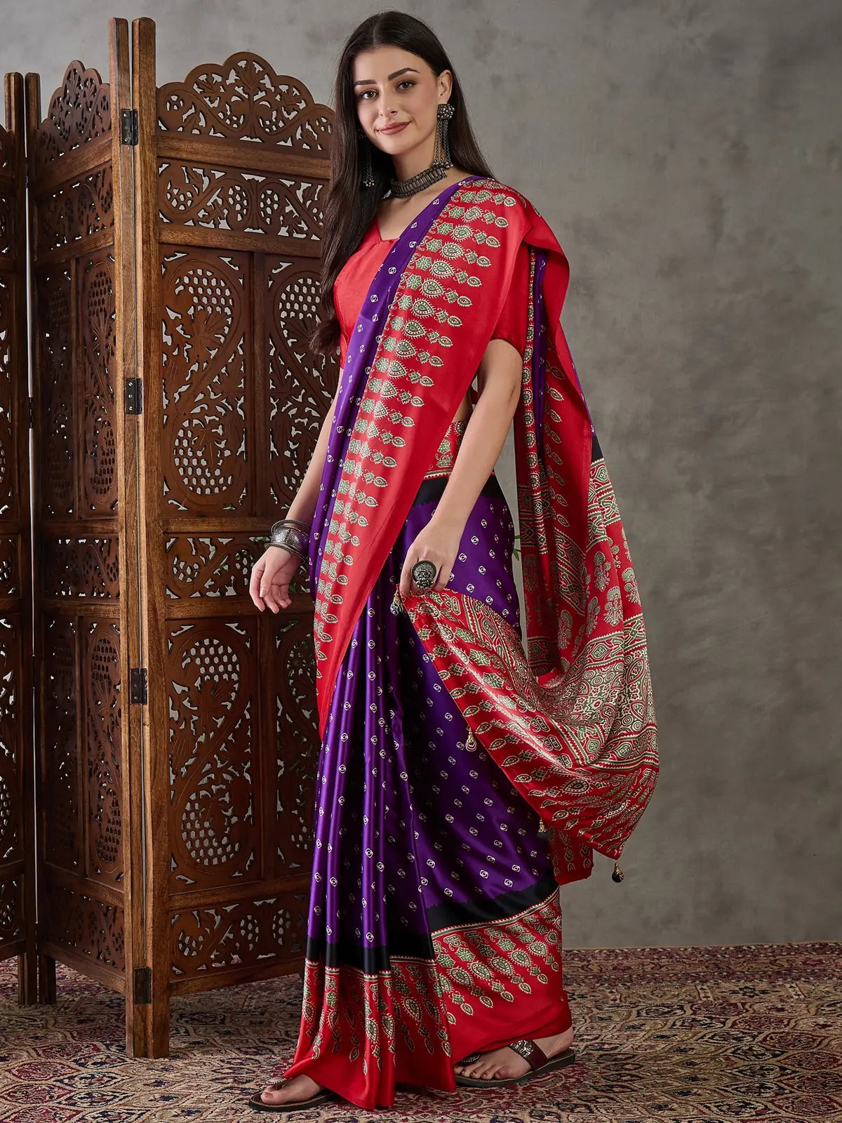 Tarani Pankaja purple saree elegant side pose printed design