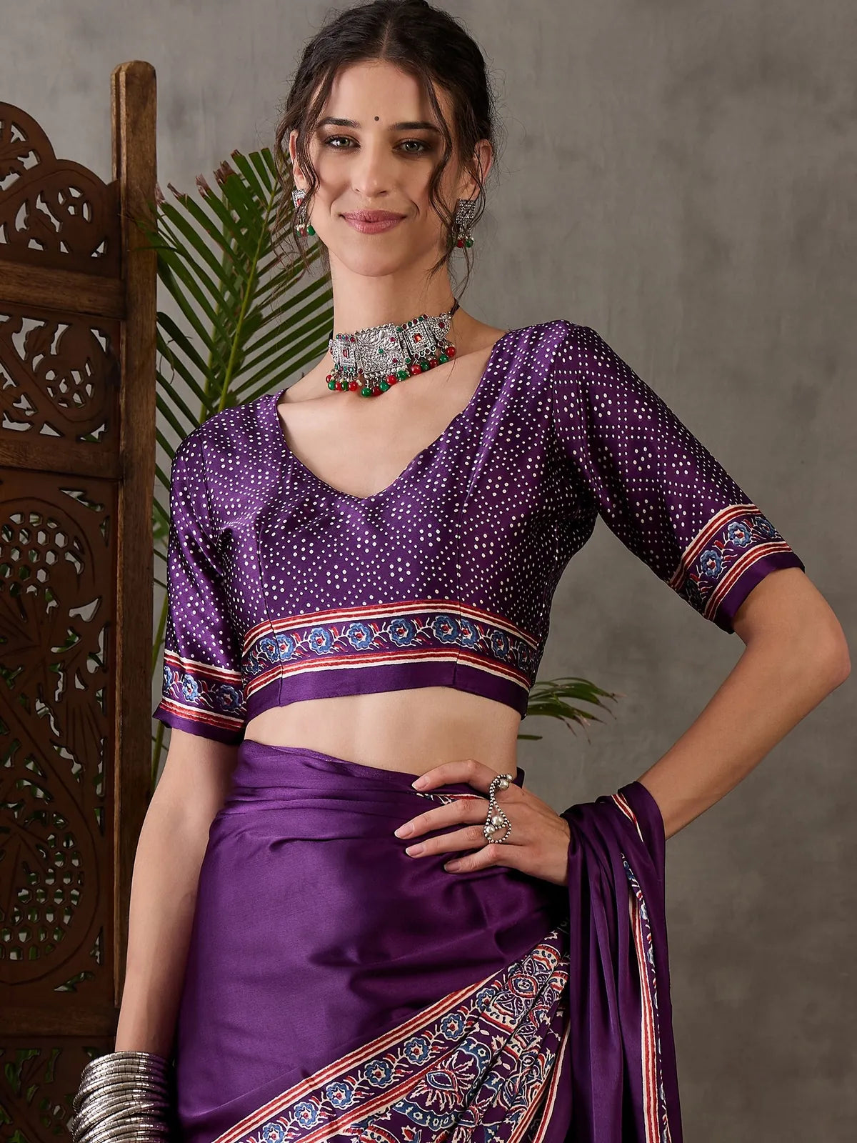Tarani Jigyasa purple semi modal satin blouse and saree upper body view with printed detailing