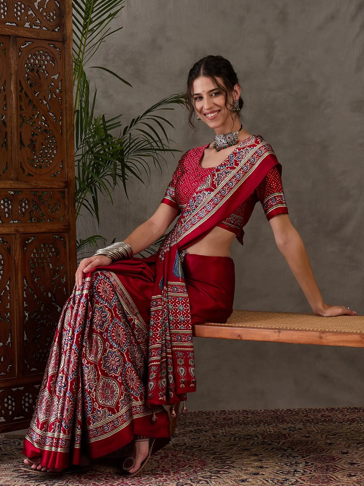 Tarani red Semi Modal Satin saree front pose with elegant festive styling