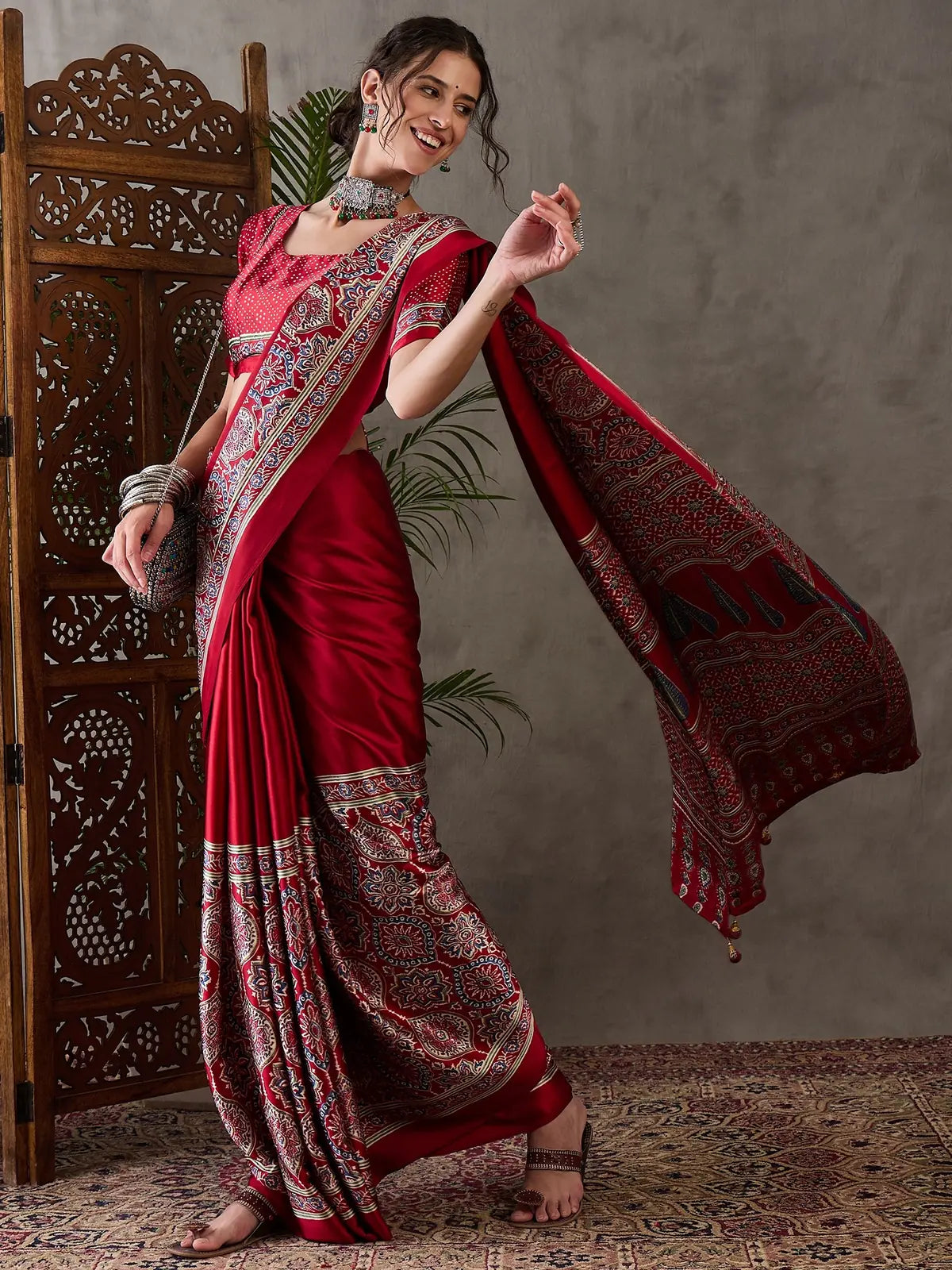 Tarani red Semi Modal Satin printed saree flowing full view with decorative pallu
