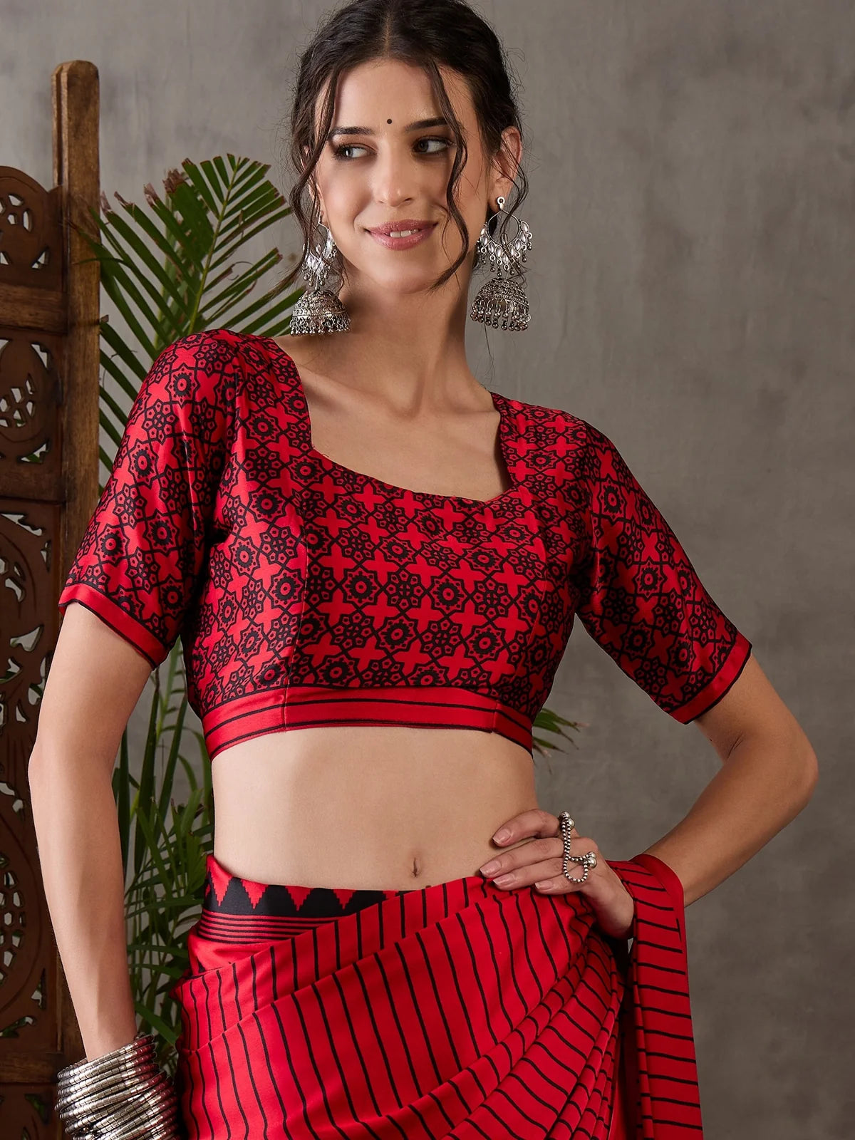 Tarani red semi modal satin saree upper body view with printed blouse and elegant border