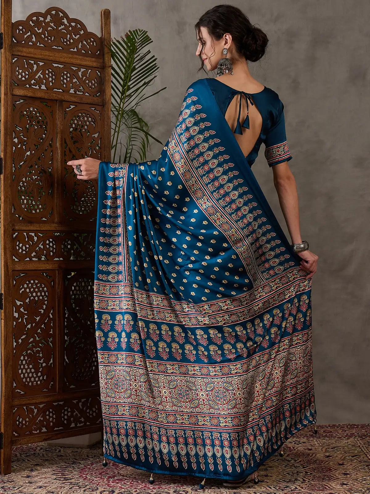 Tarani Namrata teal semi modal satin saree back view showing pallu