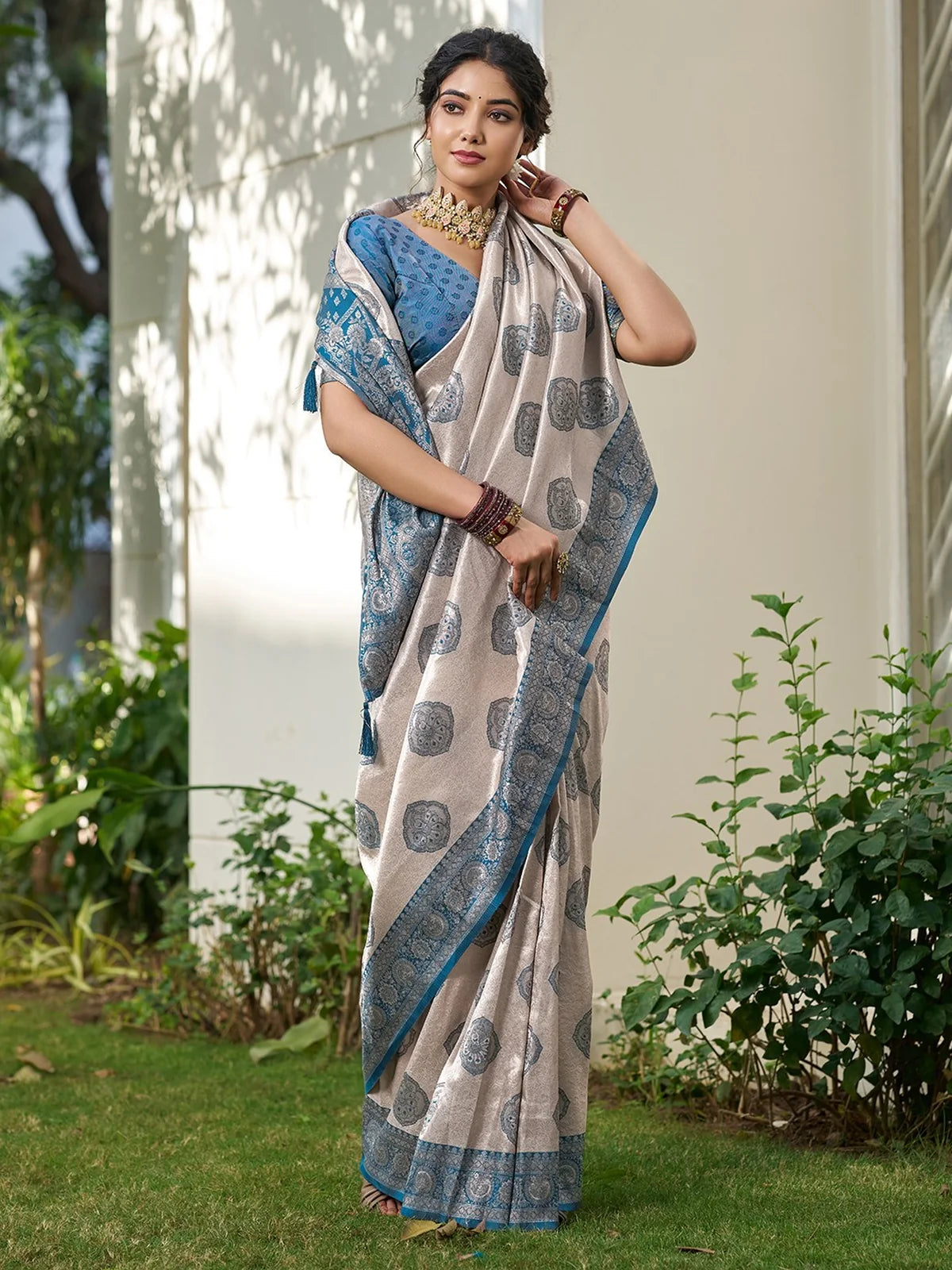 Tarani Bhagya blue silk blend saree front full drape with rich woven motifs