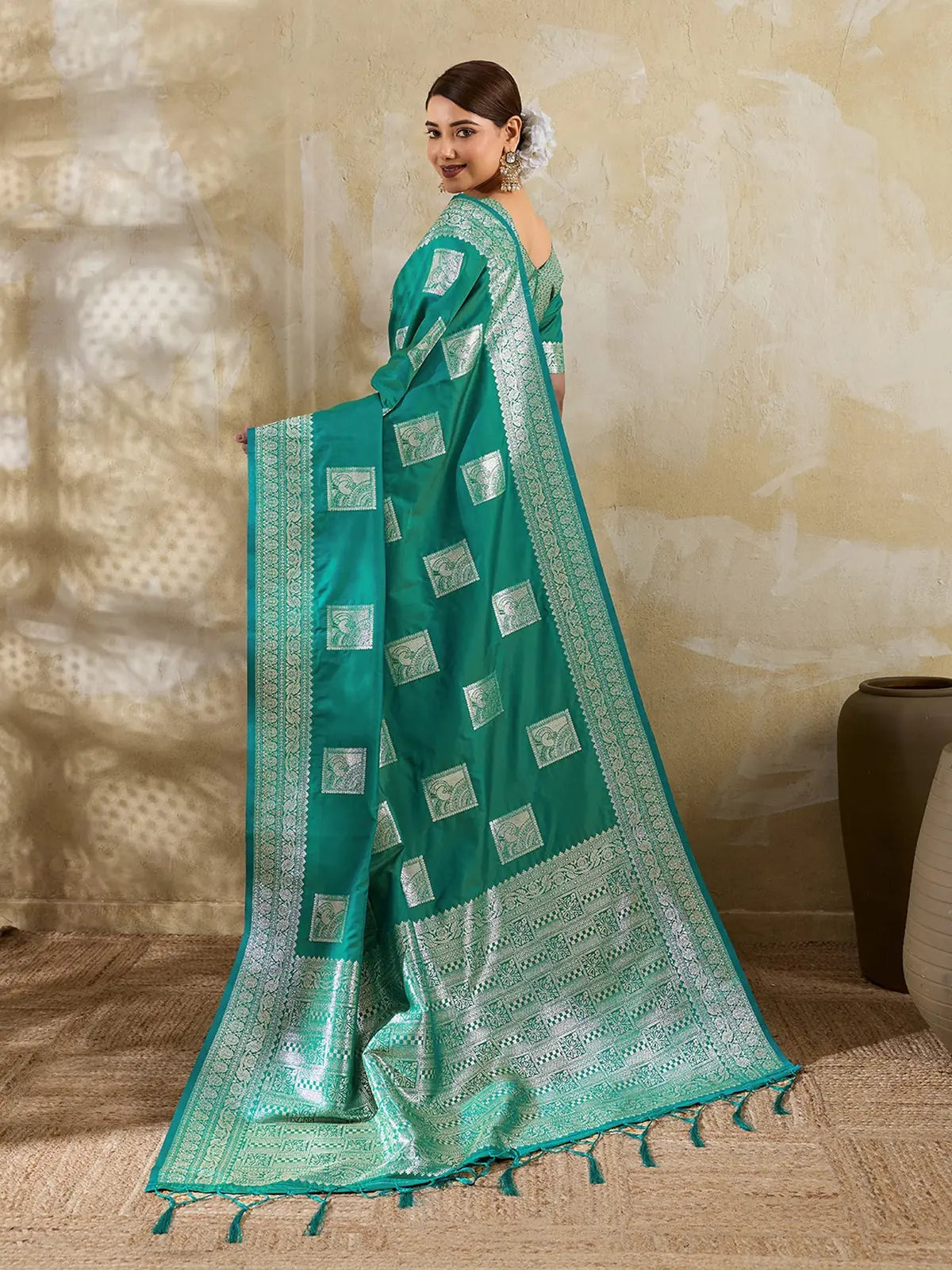 Tarani green silk blend saree back view with zari border and traditional woven design