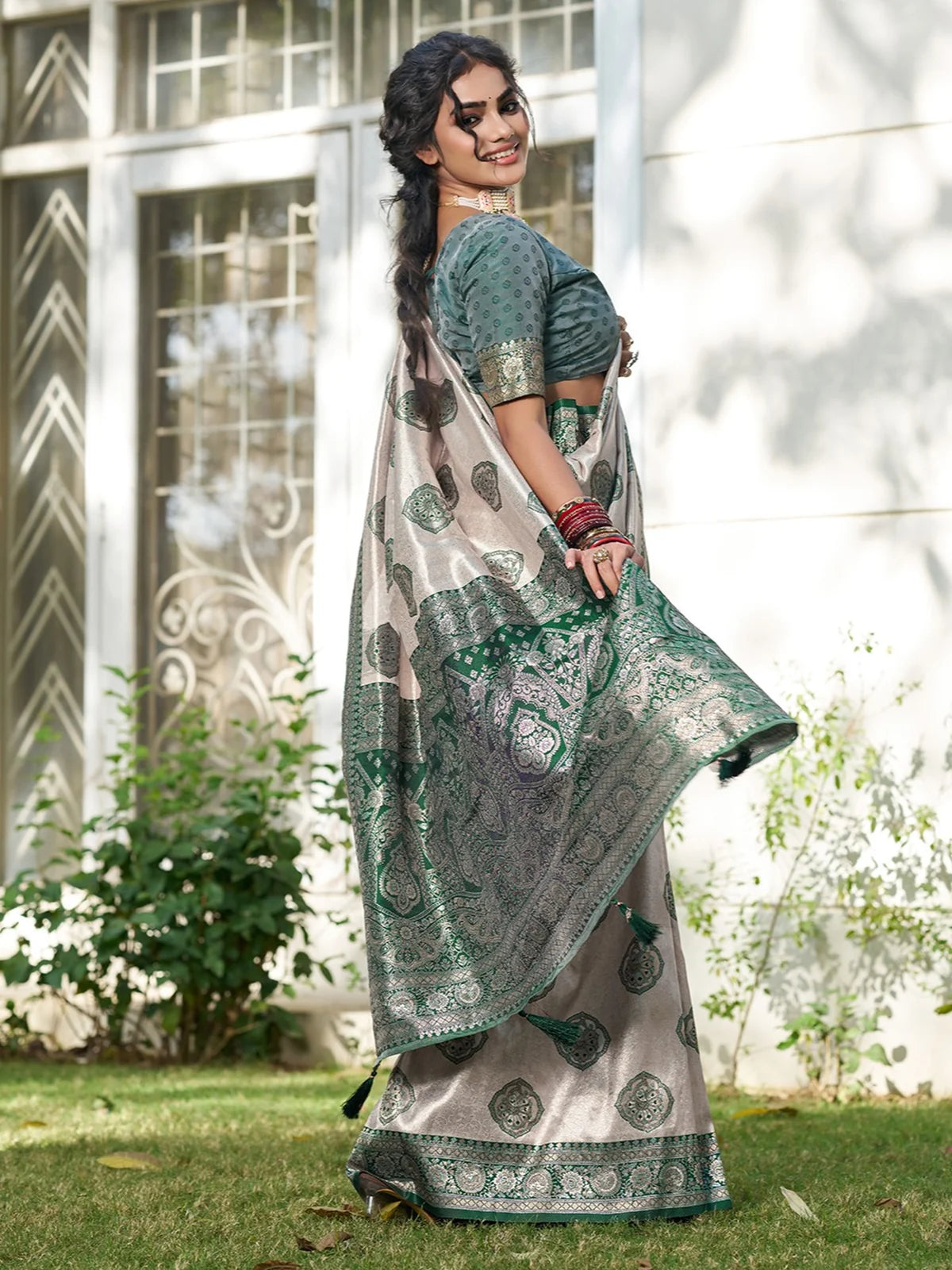 Tarani Gaurika green silk blend saree back view showing blouse pattern and pallu