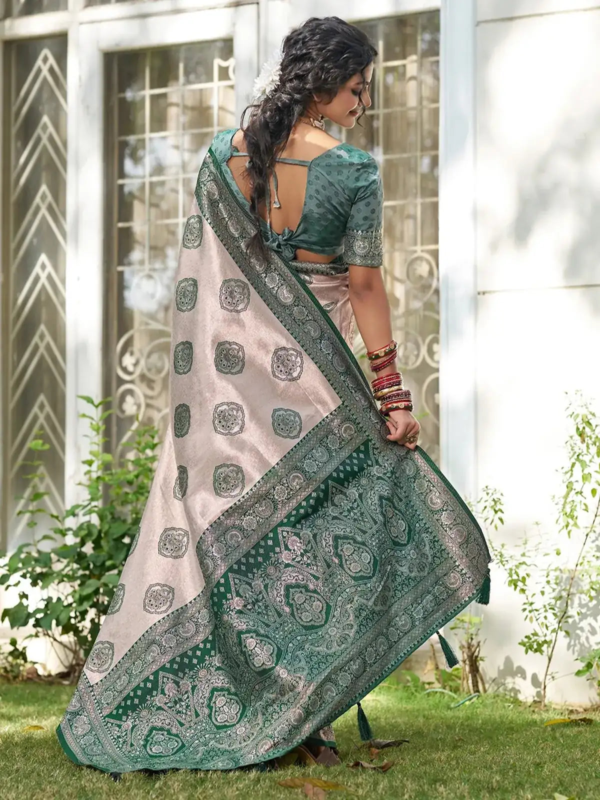 Tarani Gaurika green silk blend saree rear drape with detailed pallu and woven motifs