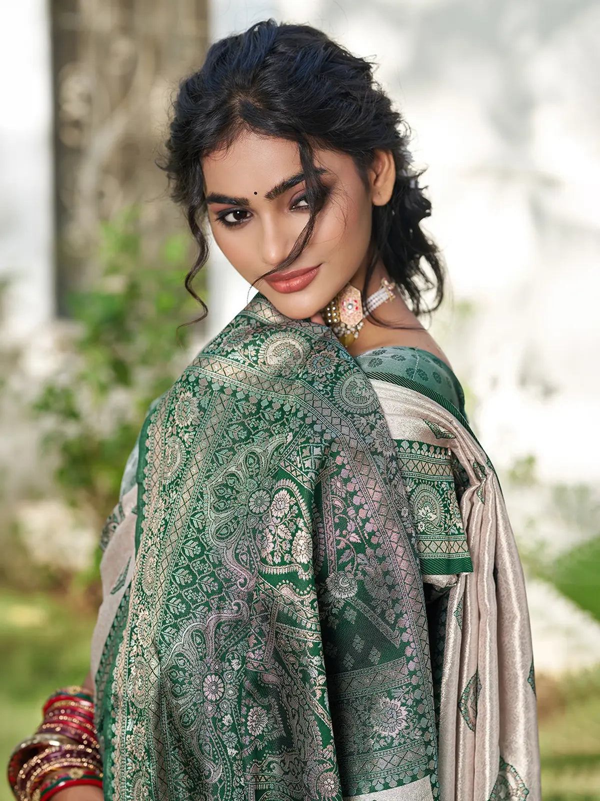 Tarani Gaurika green silk blend saree pallu view with intricate woven detailing