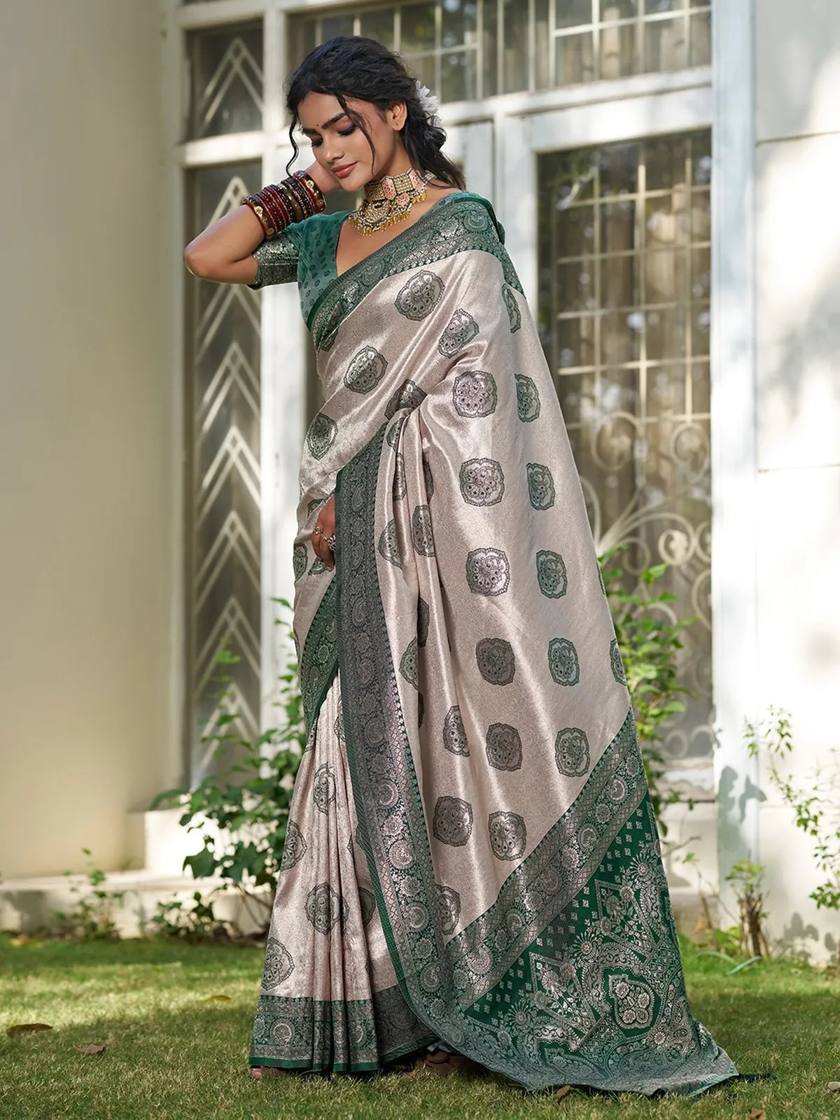Tarani Gaurika green silk blend saree side view with graceful drape and zari border