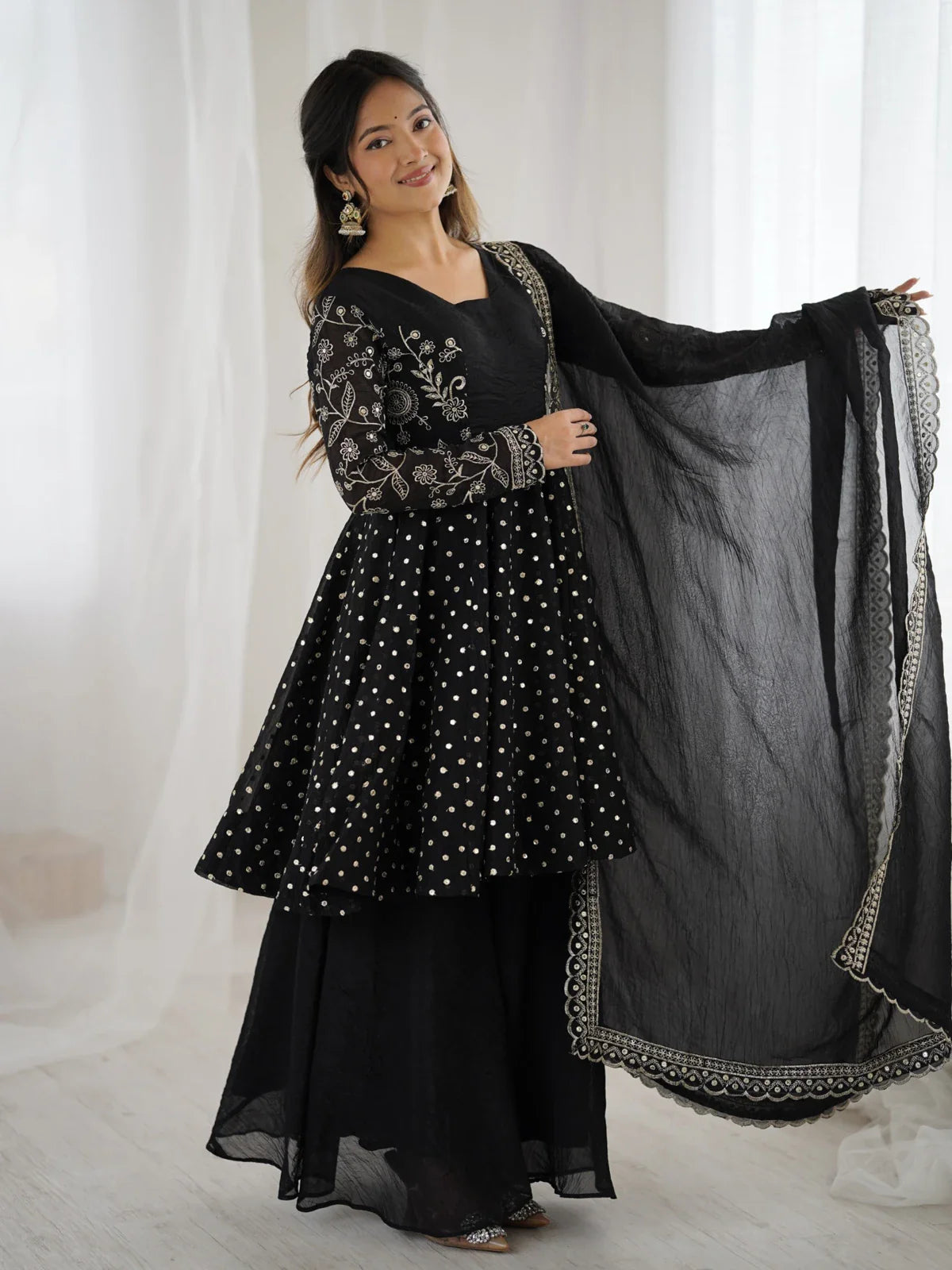 Tarani black silk embroidered sharara dress with dupatta for festive and wedding wear