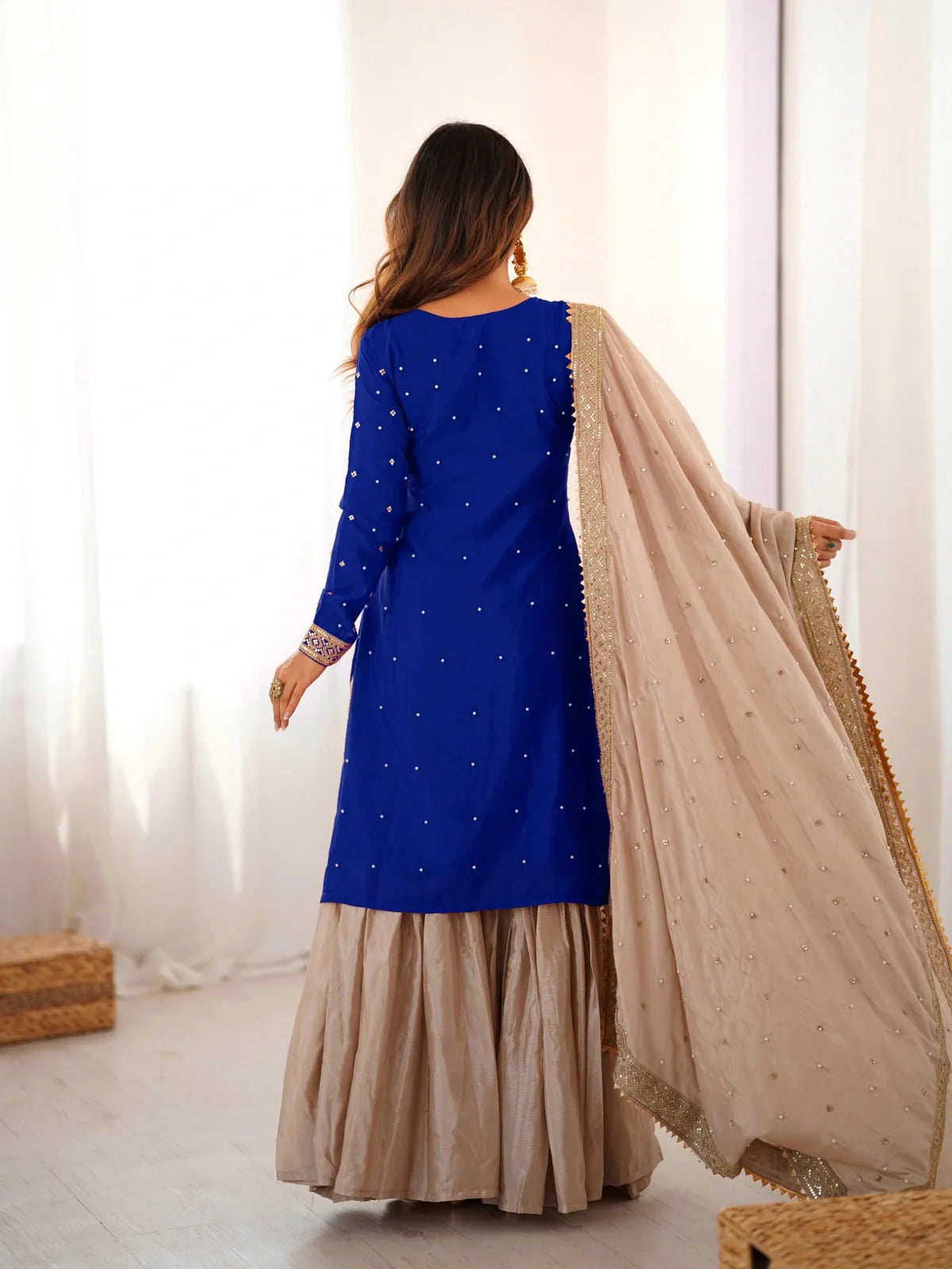 Tarani blue chinon silk dress back view with dupatta and sharara flare