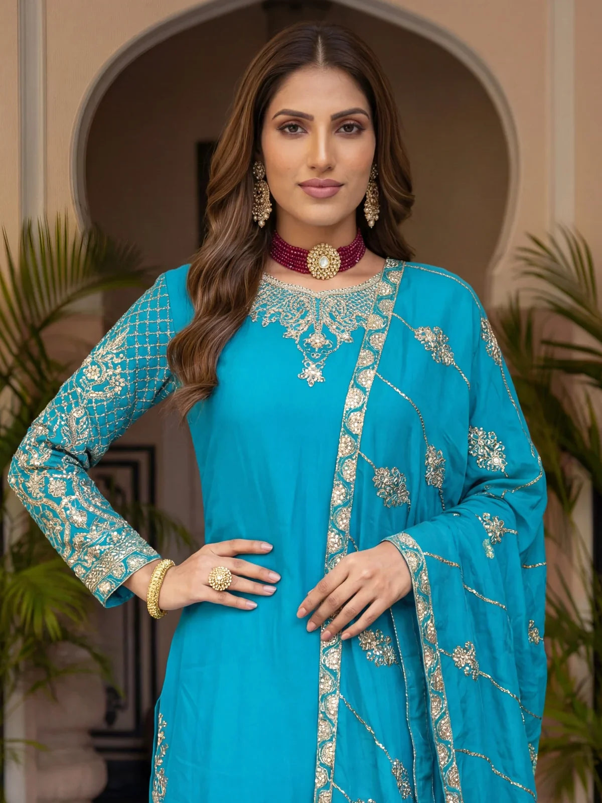 Tarani front upper-body embroidery and neckline detailing on blue silk dress