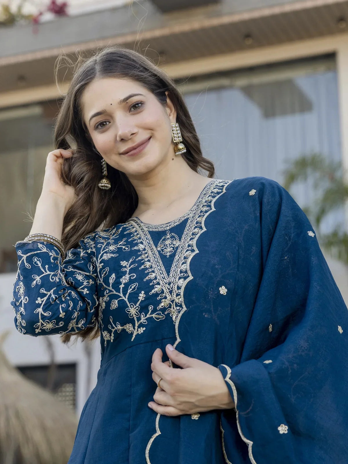 Tarani premium blue silk dress embroidery close-up on upper half body