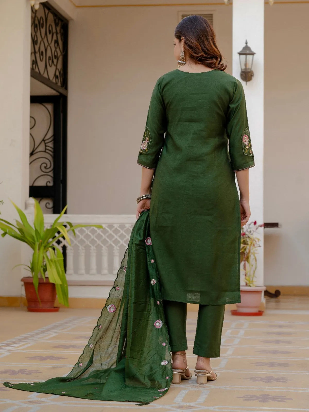 Back view of Tarani green silk kurti with pant and embroidered dupatta