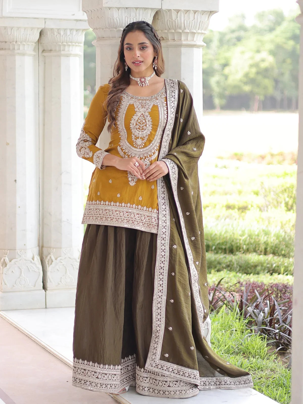 Tarani festive green silk dress with sharara and embroidered neckline front view