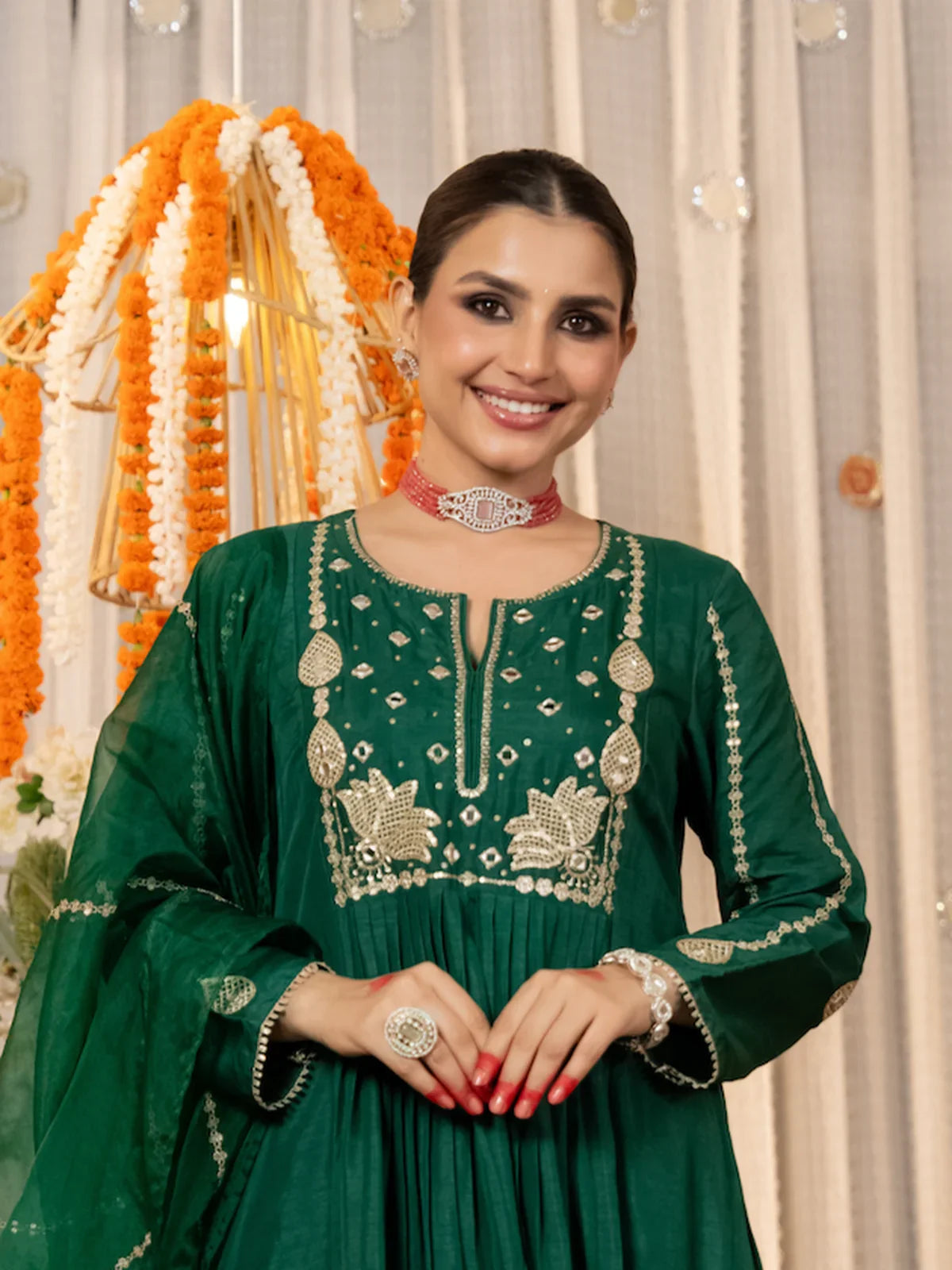 Tarani green silk dress with embroidery, upper body view showing neckline and sleeves