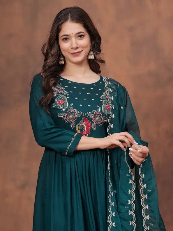 Tarani elegant green silk dress close-up showing embroidery details