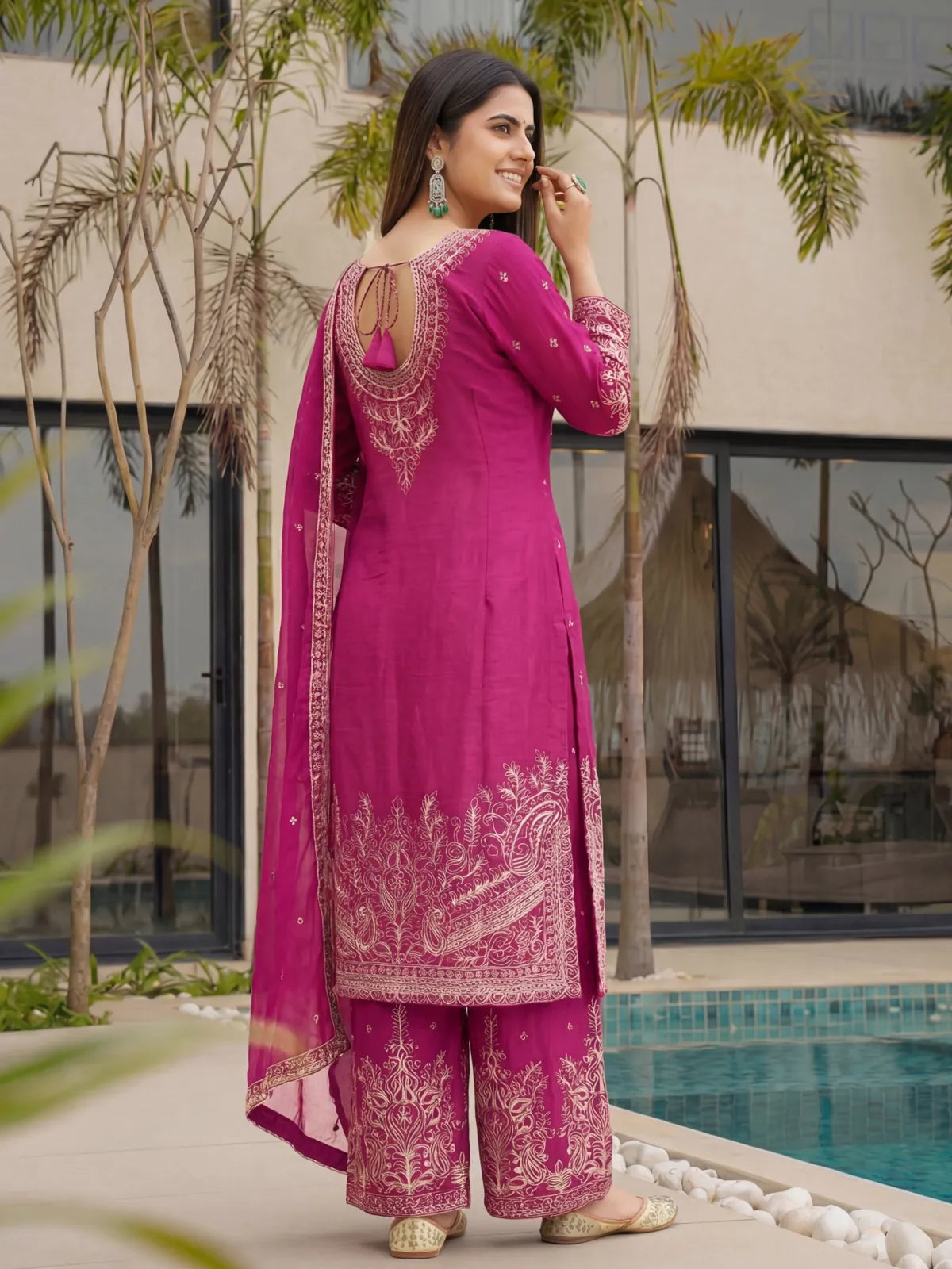 Tarani magenta Chinon Silk sharara suit back view showing keyhole back neck and border embroidery