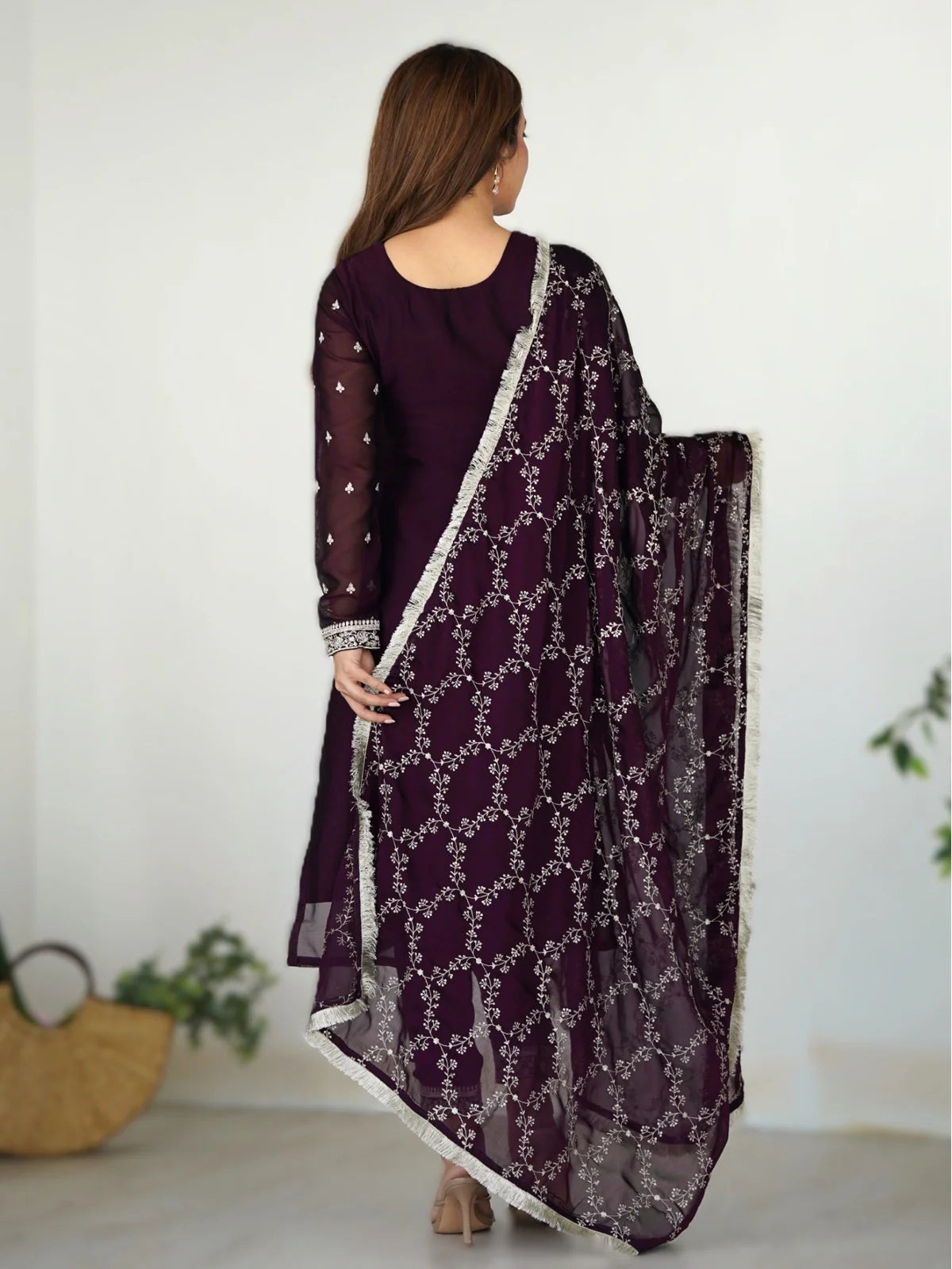 Back view of Tarani maroon embroidered silk dress with dupatta and full-length styling