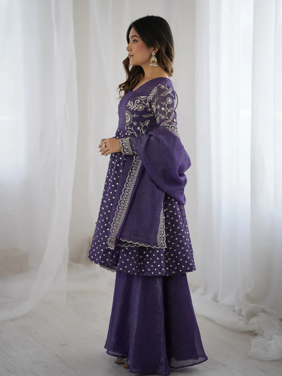 Tarani purple silk dress side view showing embroidery work and elegant silhouette