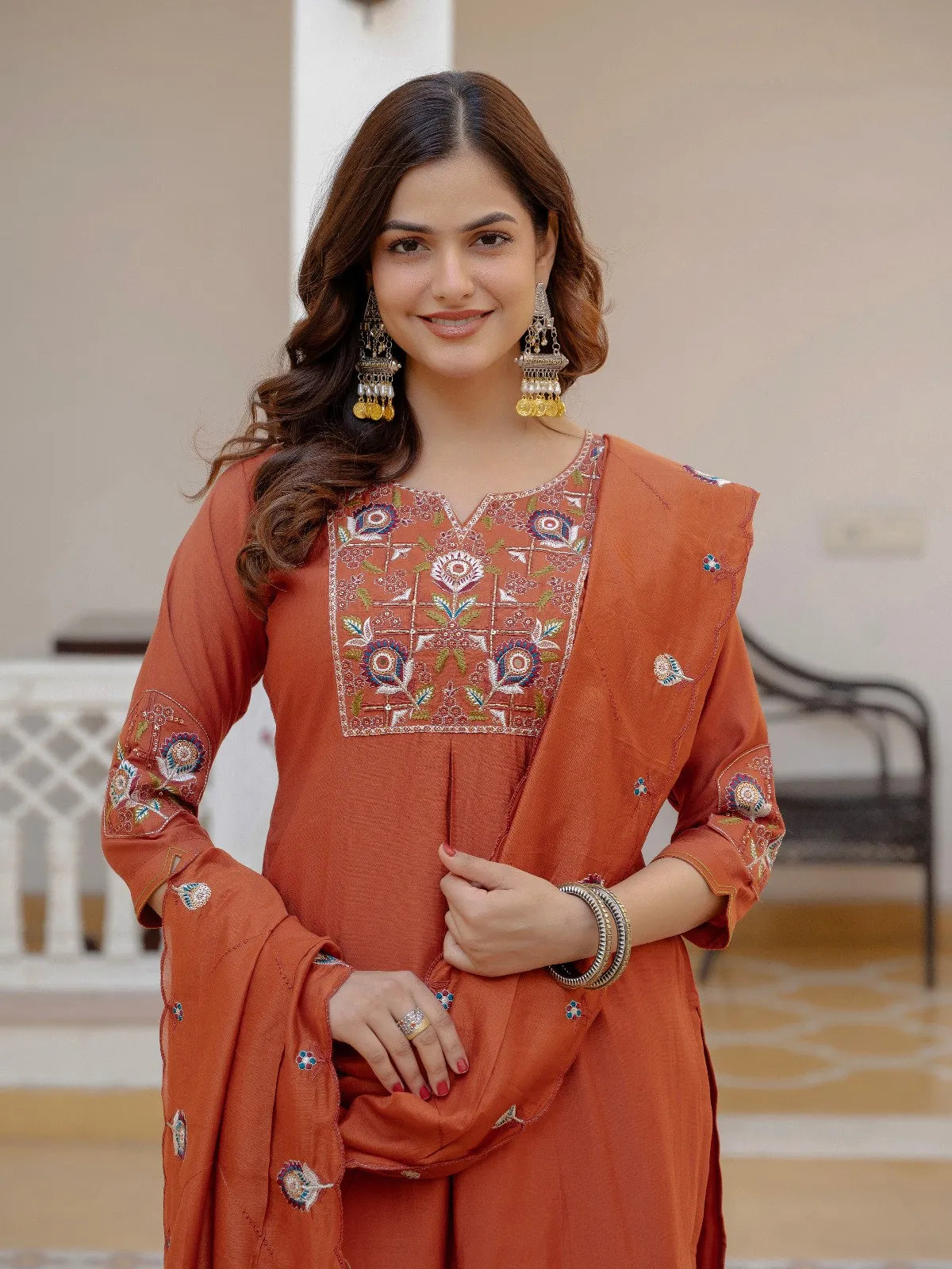 Tarani rust mango silk kurti set closeup with embroidery on yoke and sleeves