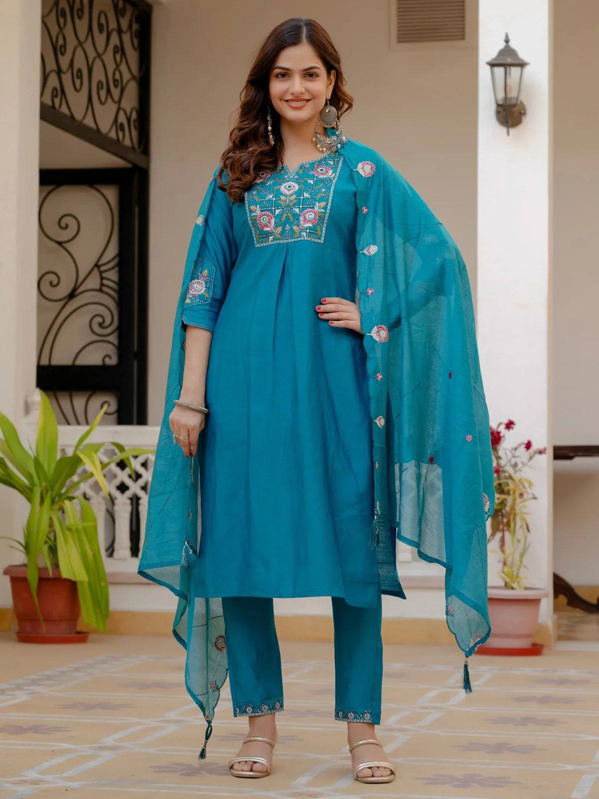 Tarani teal silk embroidered dress with pant and dupatta in front view for festive occasions