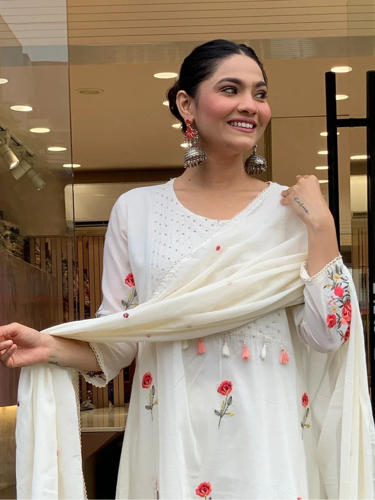 Tarani white chanderi silk festive dress upper body view with pink floral embroidery